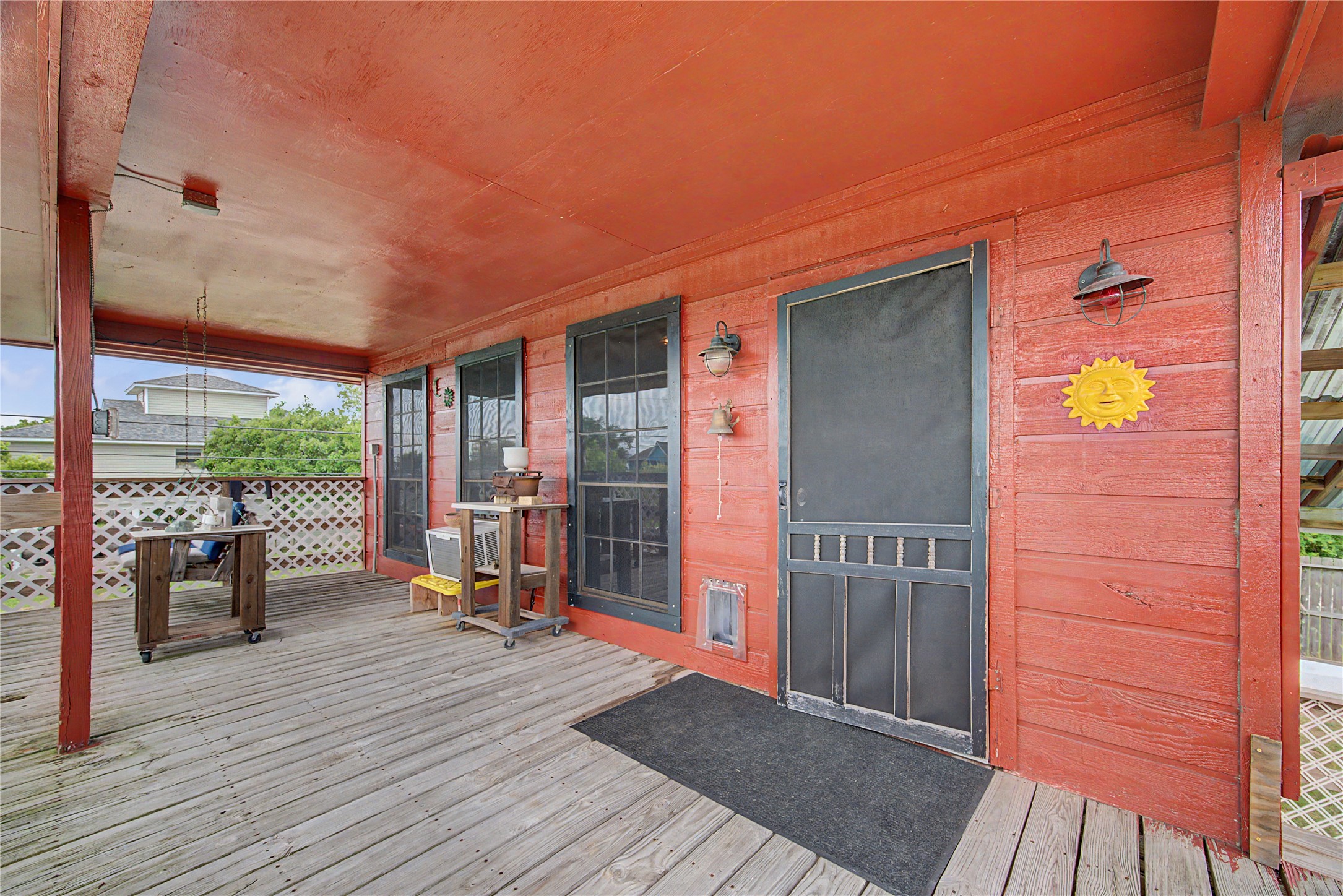 upstairs porch and entry door into home