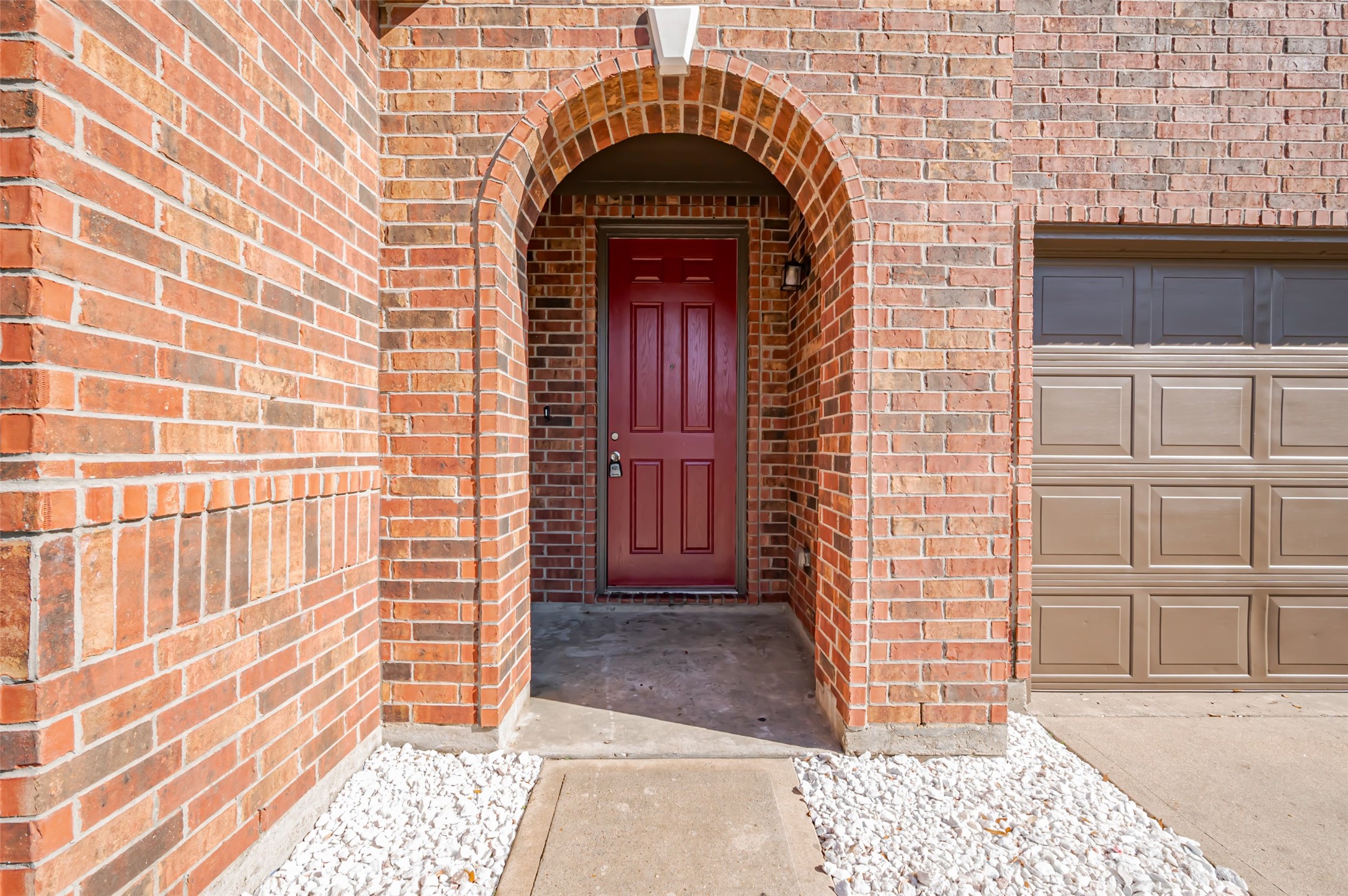Entrance arched with brick exterior. Entrance arched with brick exterior.