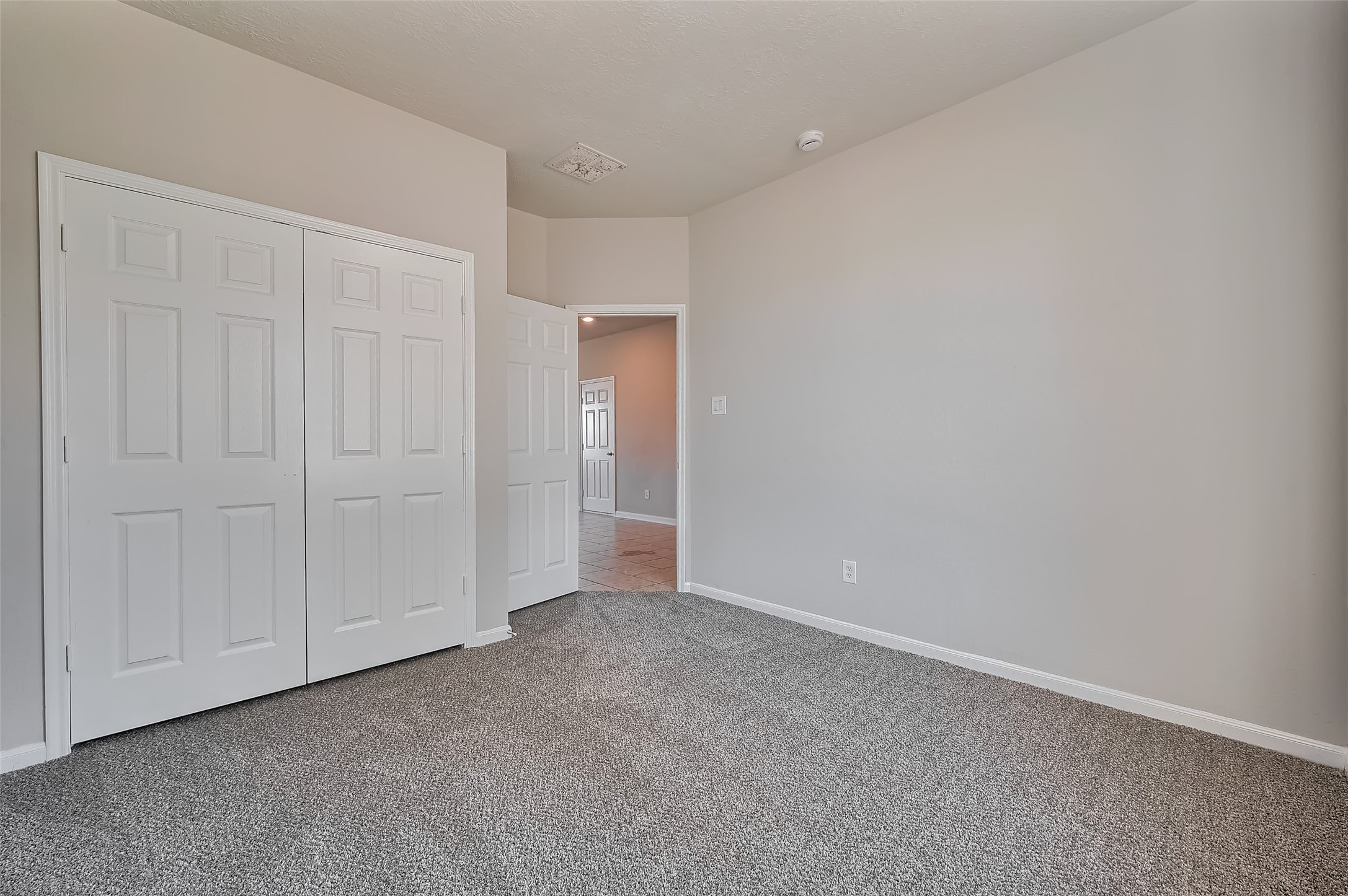 Bedroom featuring a spacious closet