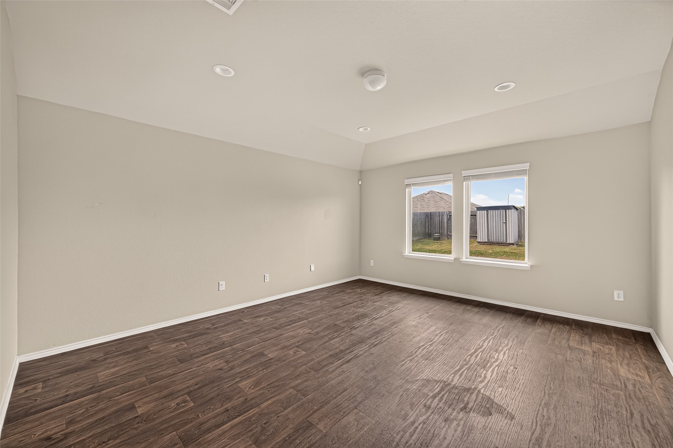 Living room has vinyl flooring.