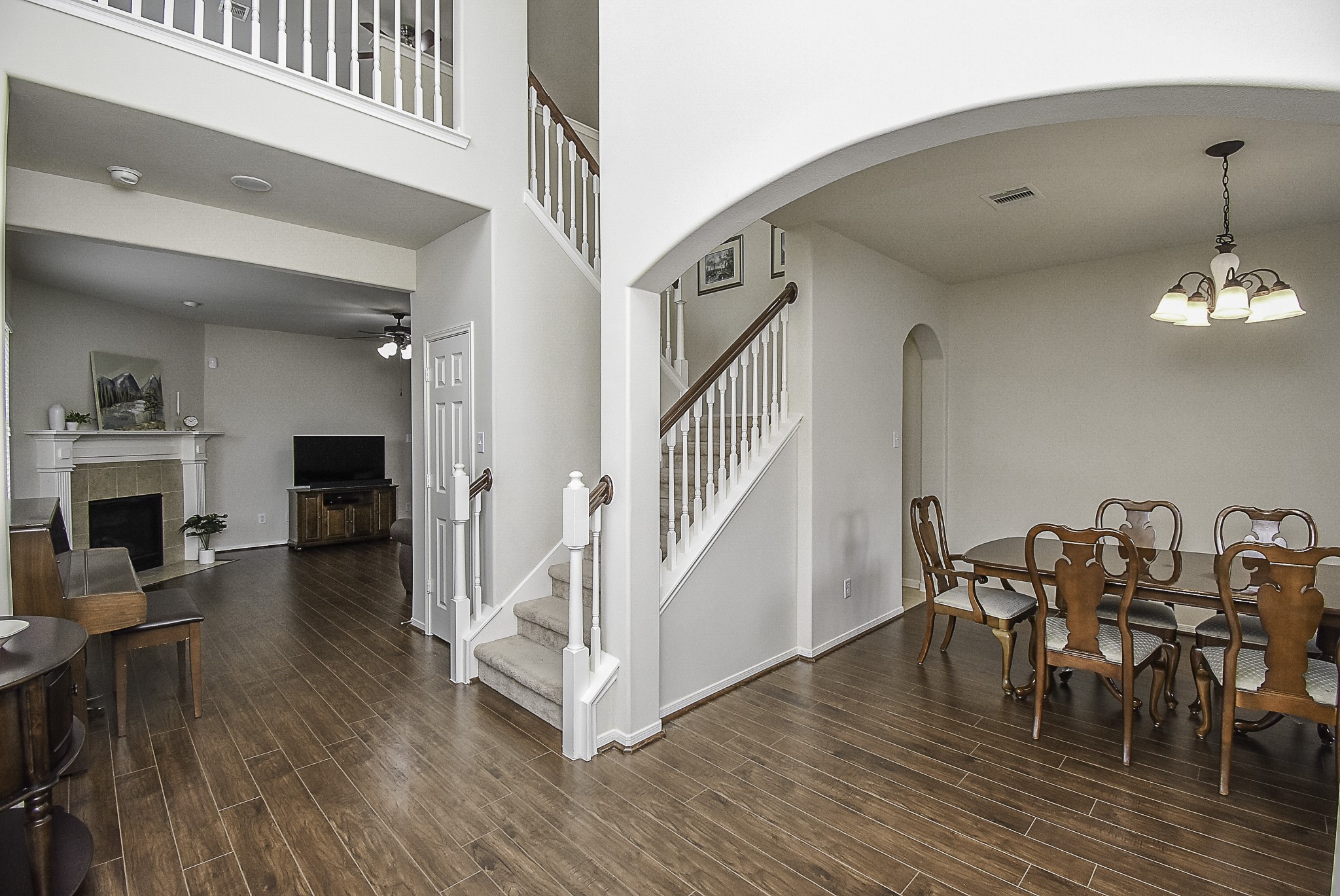 Beautiful hardwood floors greet you upon entering the home.