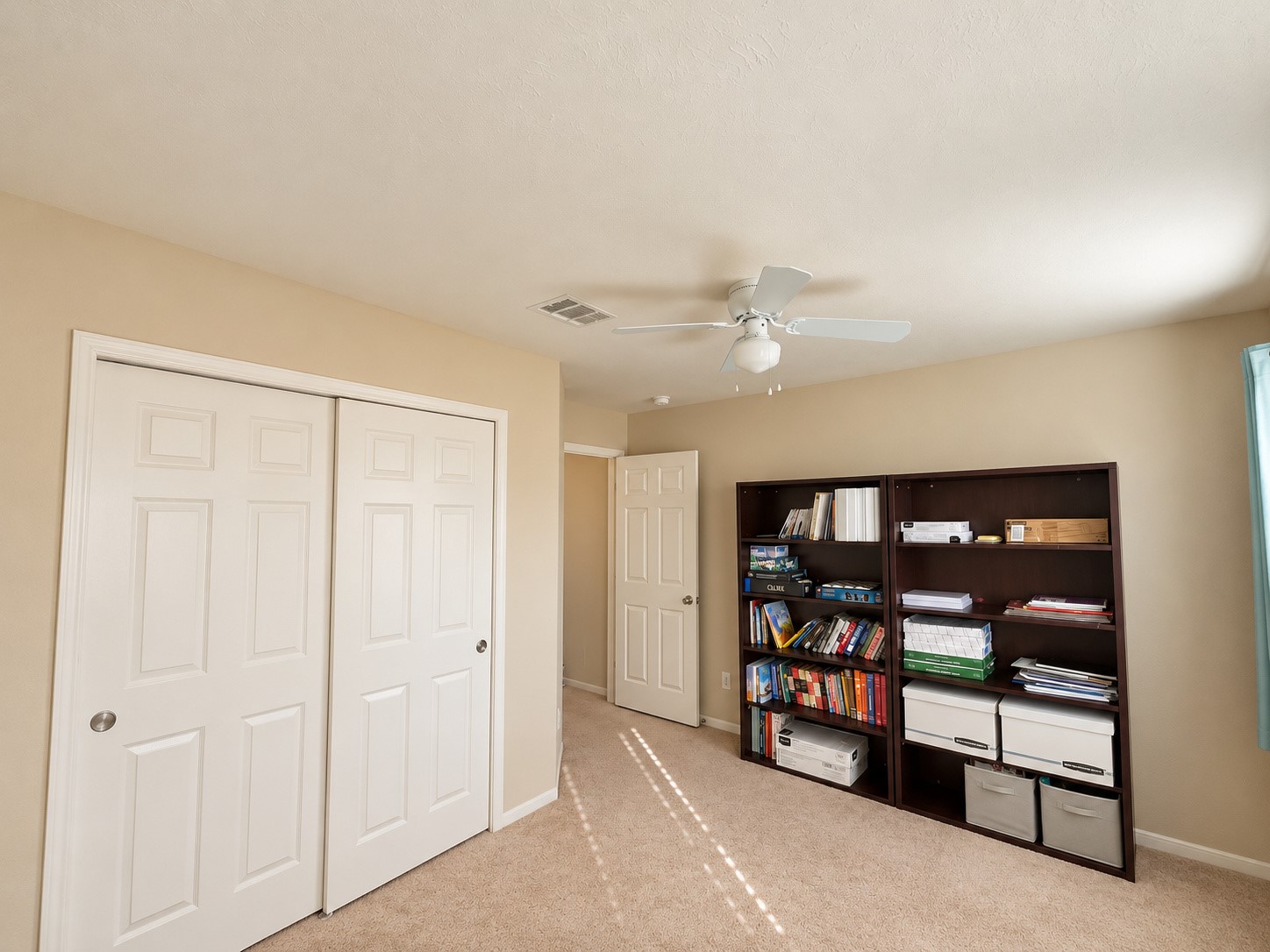 Alternate view of the fourth bedroom showcasing generous closet space.