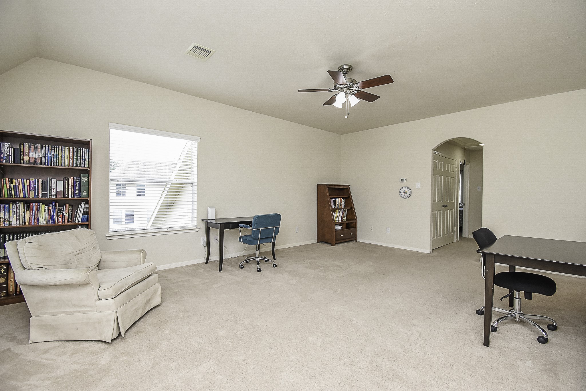 Another view highlights the generous size and versatility of the upstairs game room.