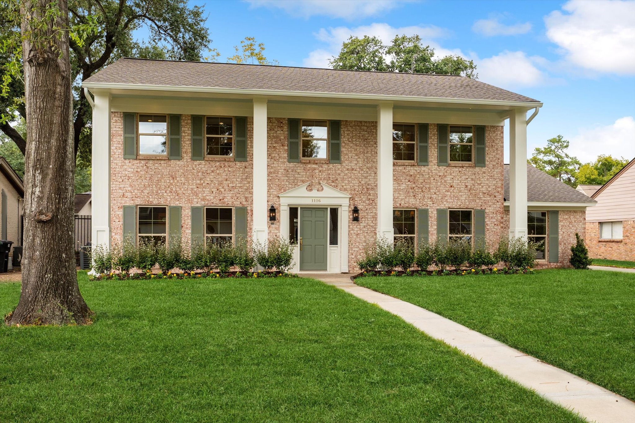 From the curb, you can tell this is a showstopper home!