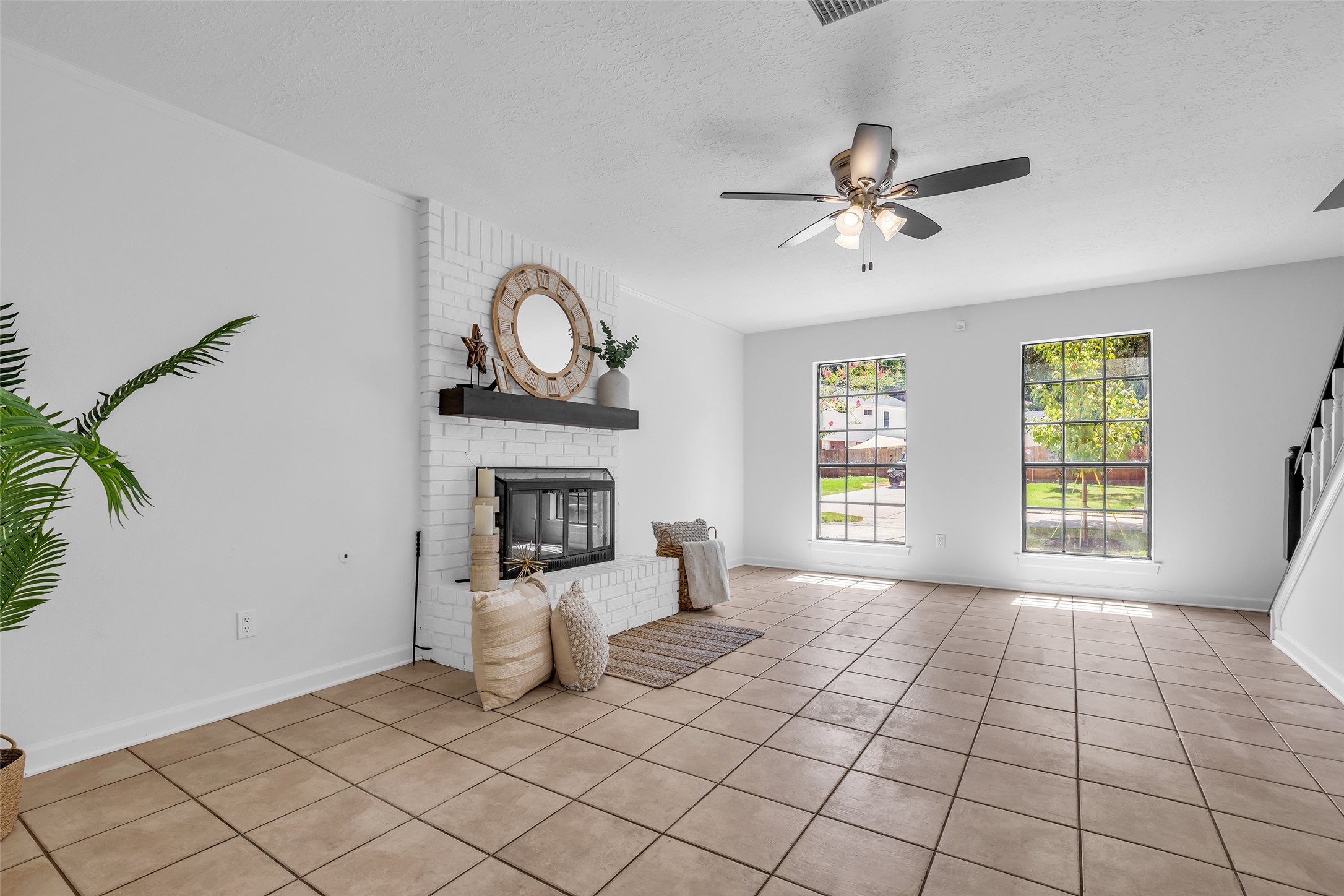 Comfortable family room featuring a cozy gas fireplace. Comfortable family room featuring a cozy gas fireplace.