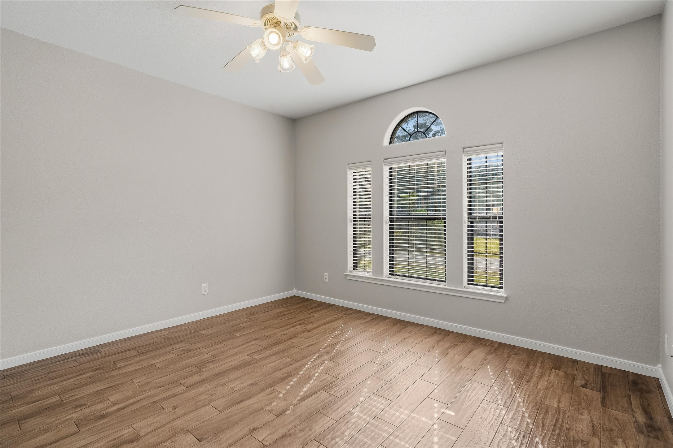 Primary bedroom, fresh paint and updated flooring