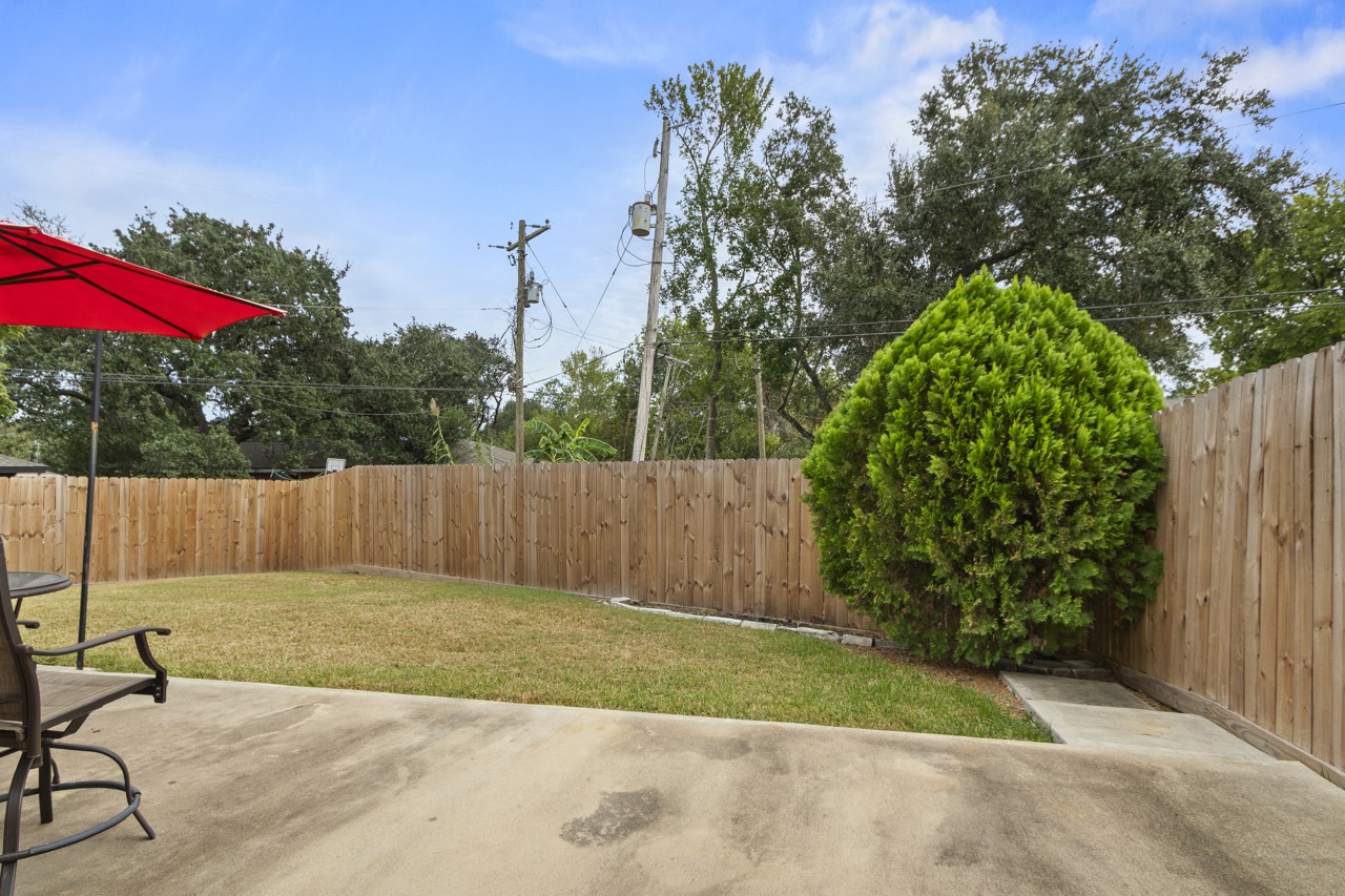 Open Porch and Fenced Backyard