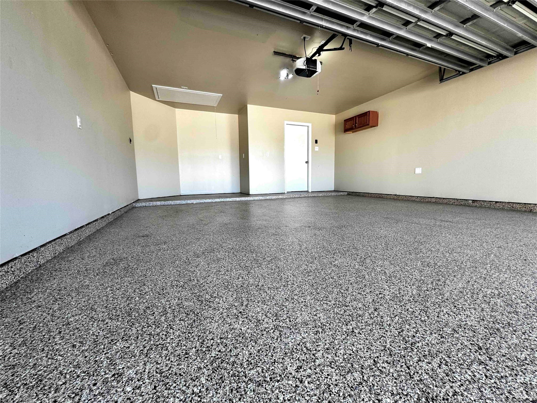 2-Car Garage has nice epoxy coating on floor