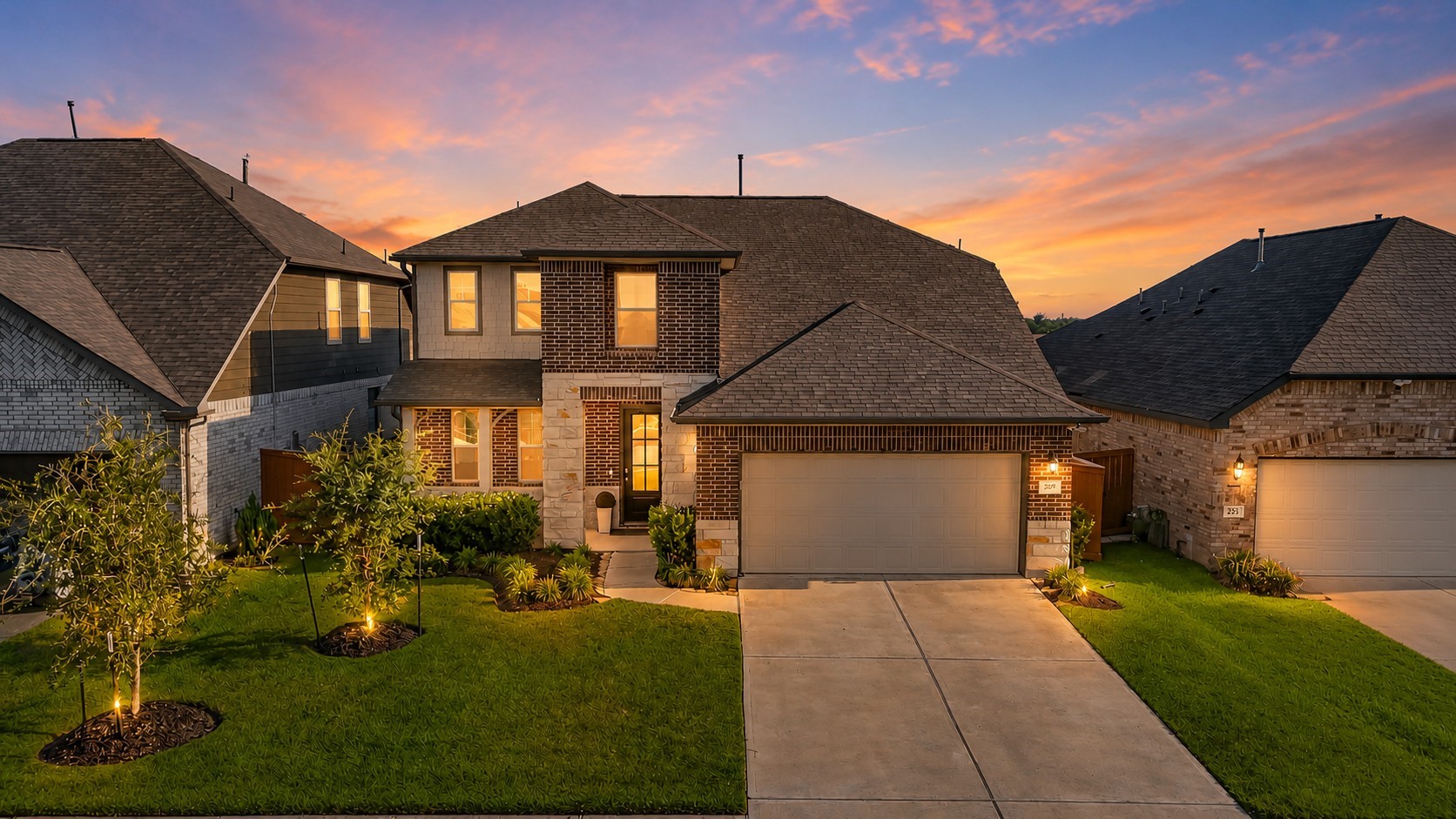 This attractive two-story home offers inviting curb appeal with a handsome blend of brick, stone, and contrasting exterior accents. A spacious two-car garage, covered front entry, manicured lawn, and established landscaping create a welcoming first impression, while the wide driveway provides convenient off-street parking. This attractive two-story home offers inviting curb appeal with a handsome blend of brick, stone, and contrasting exterior accents. A spacious two-car garage, covered front entry, manicured lawn, and established landscaping create a welcoming first impression, while the wide driveway provides convenient off-street parking.