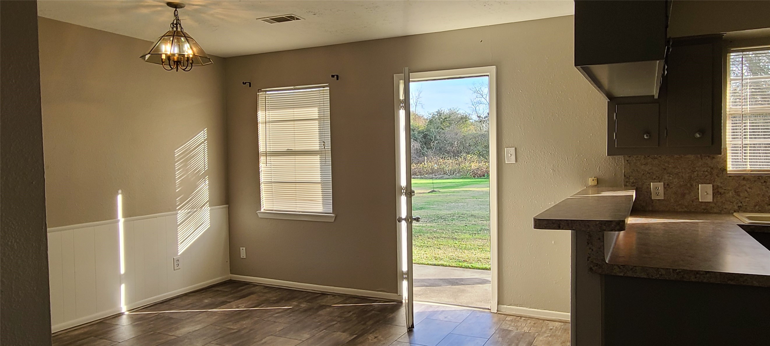 Dining Area with Kitchen To Right Dining Area with Kitchen To Right