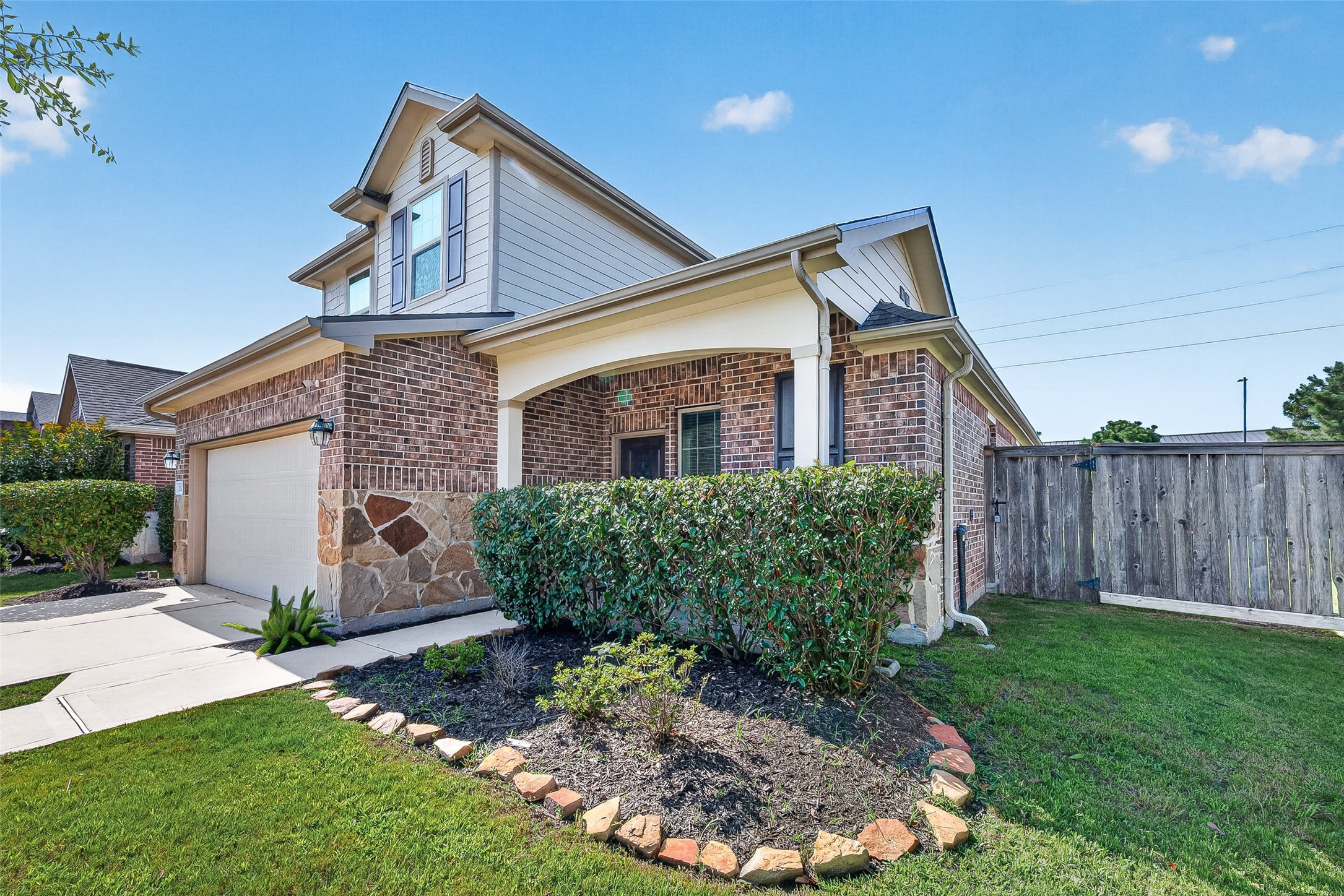Large Shrubs welcoming front porch