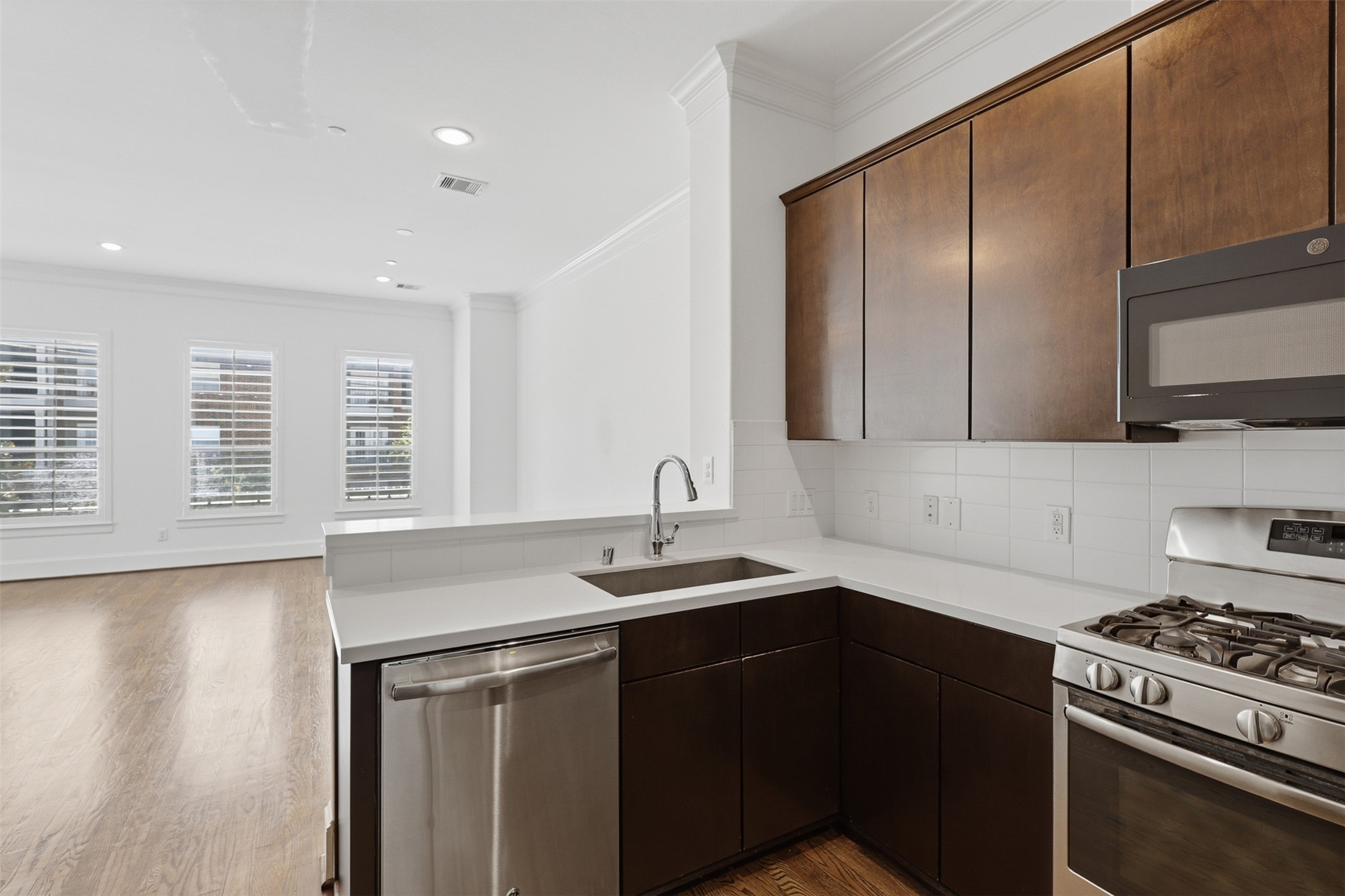 Kitchen opens to family room. Kitchen opens to family room.