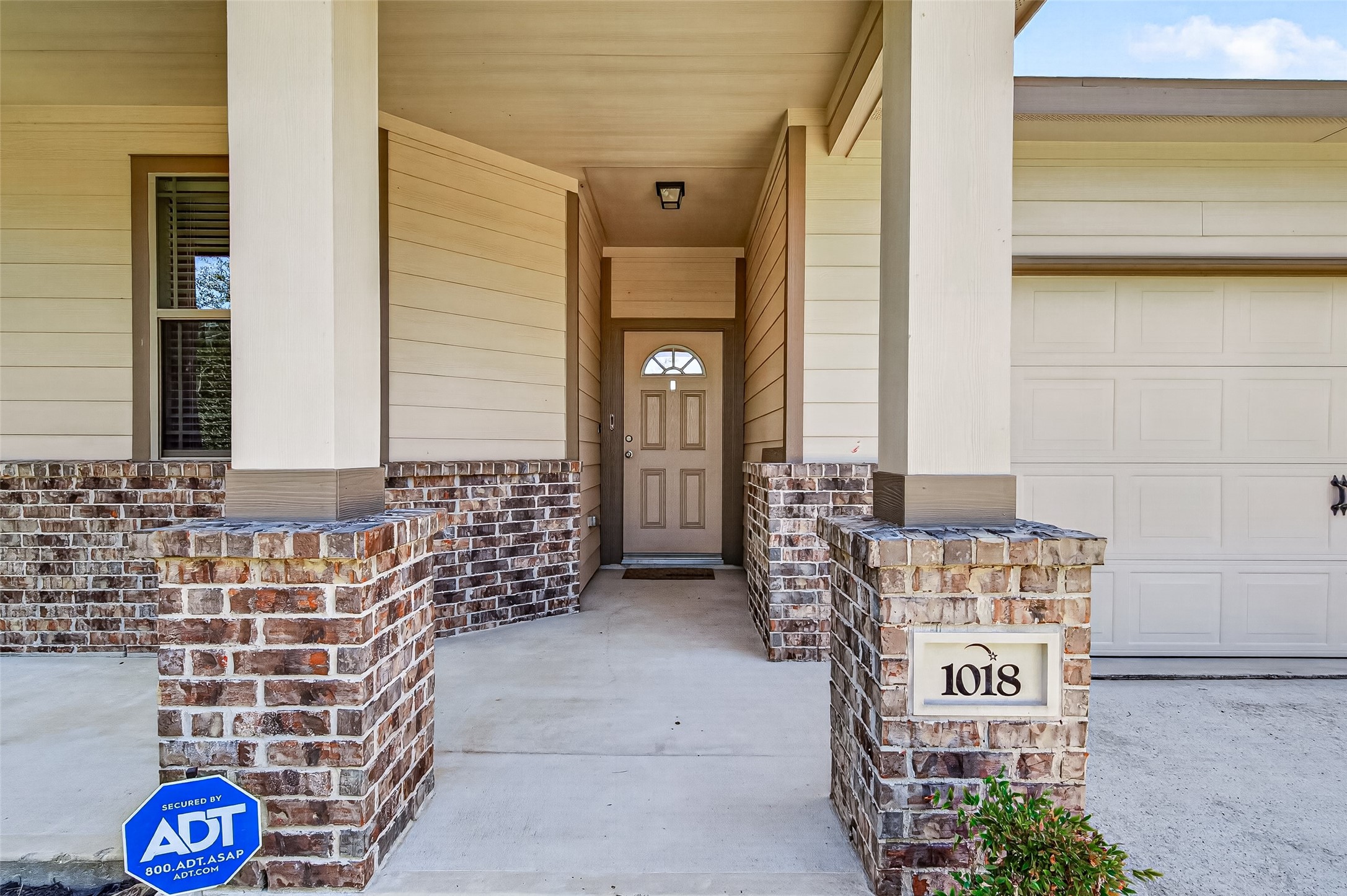 A closer look at the beautiful exterior front entry.