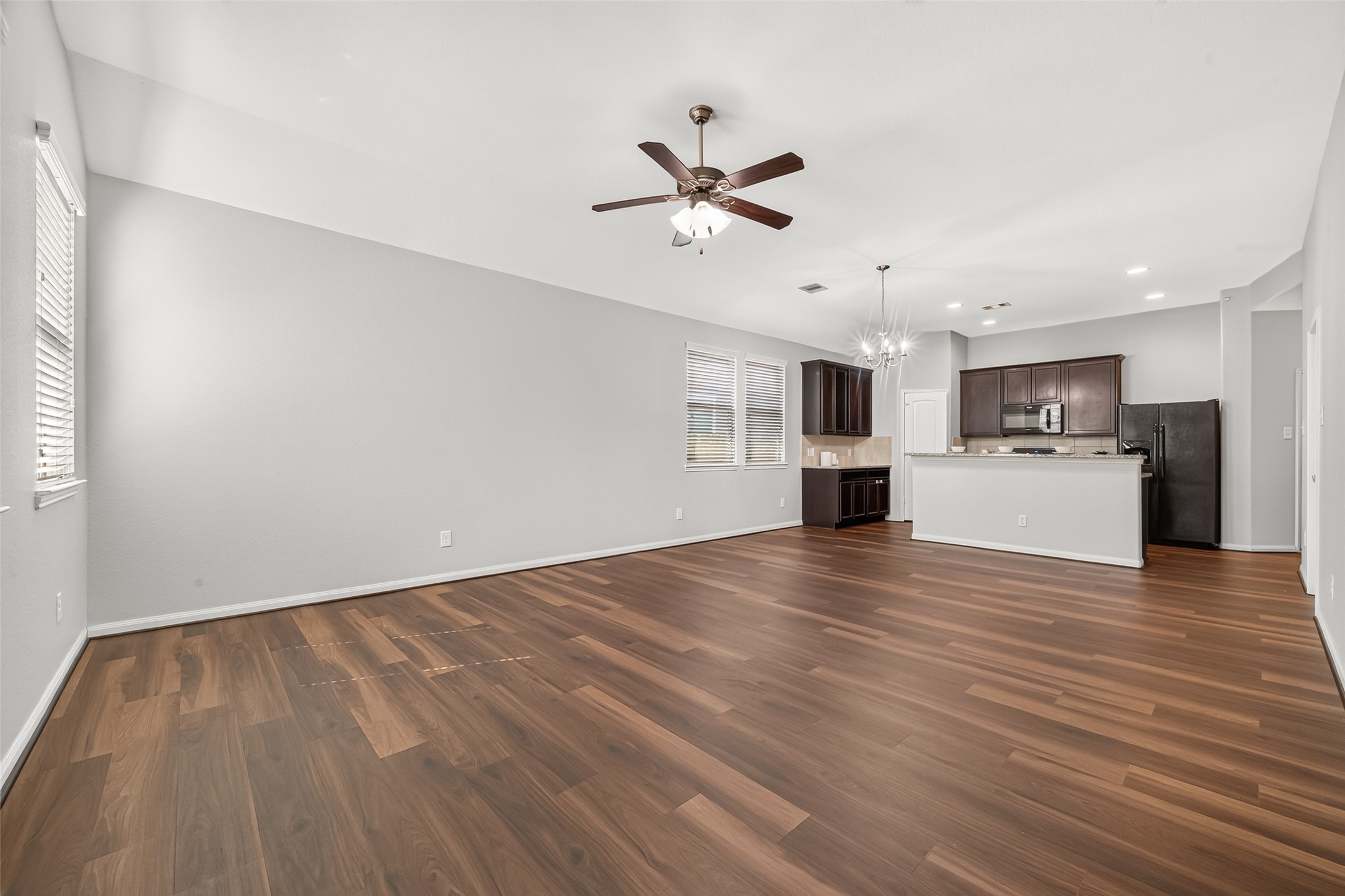 Enjoy the open-concept Living, Dining and Kitchen as they flow seamlessly together