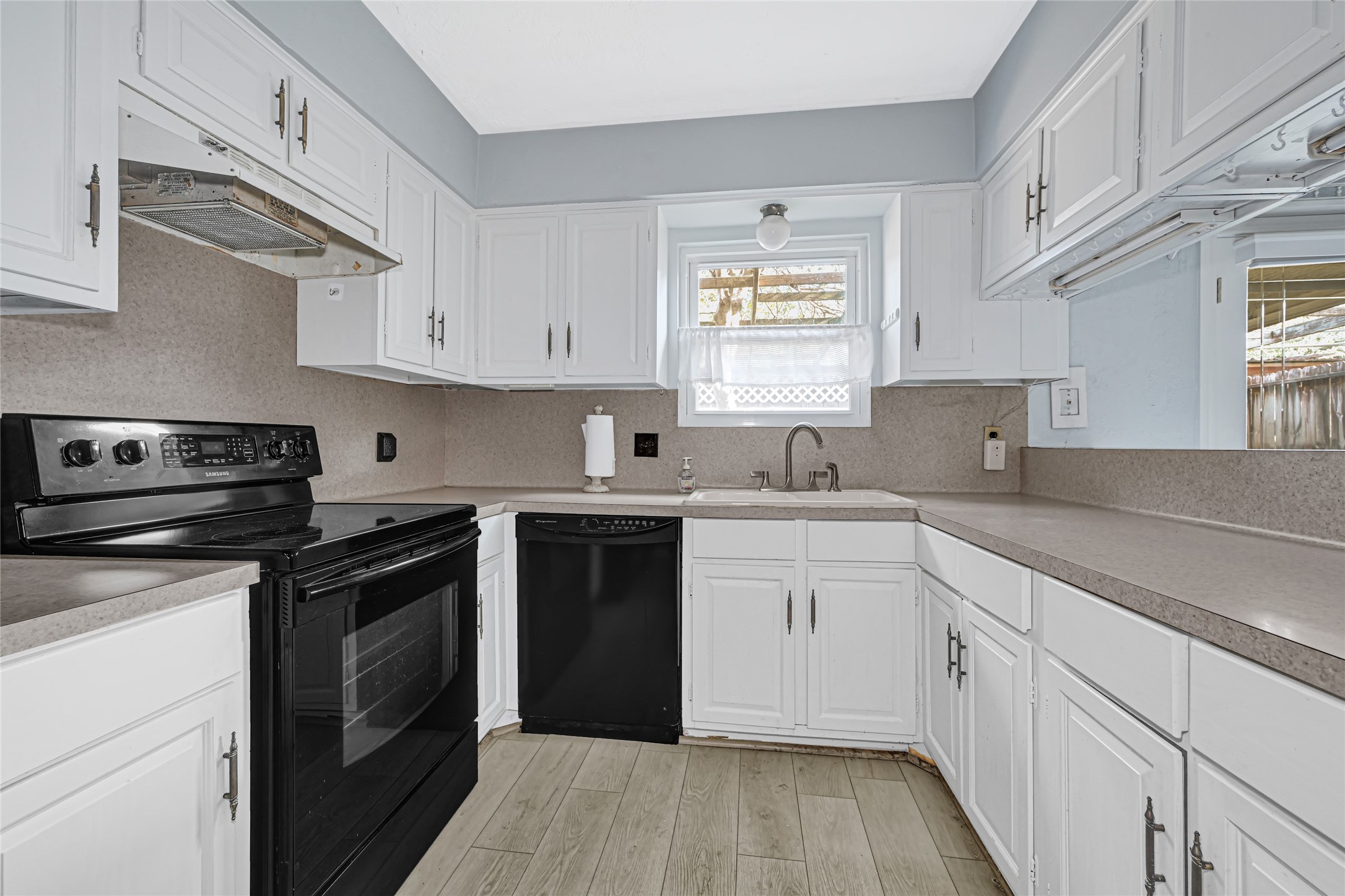 Updated Kitchen with Refrigerator, Stove and Dishwasher