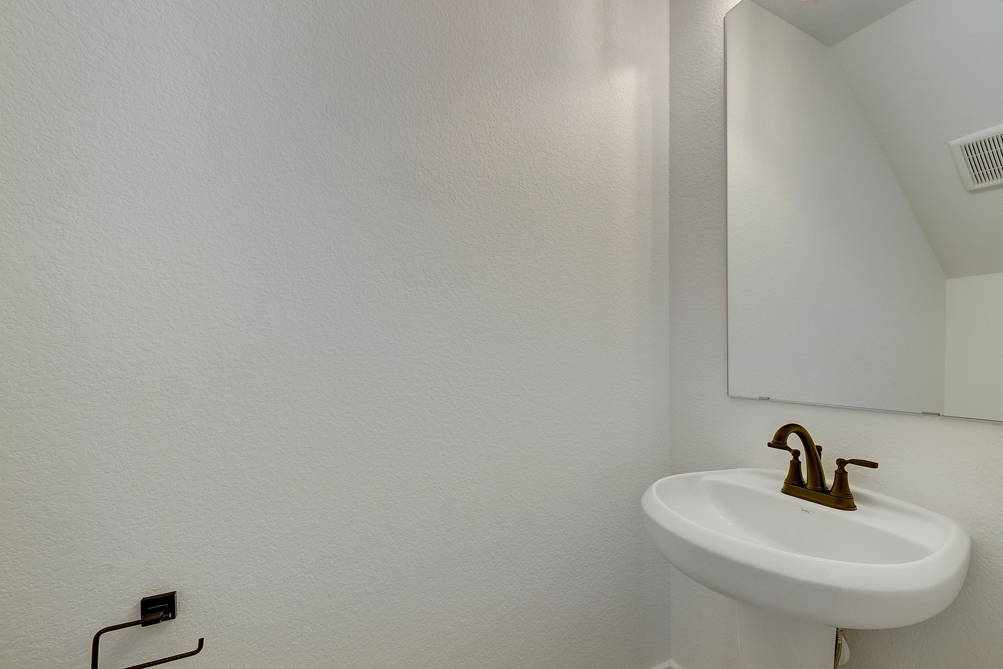 Convenient downstairs powder bath.