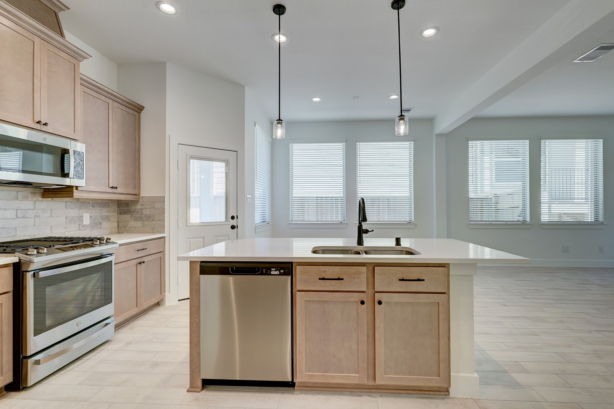 Spacious island with dishwasher and additional storage.