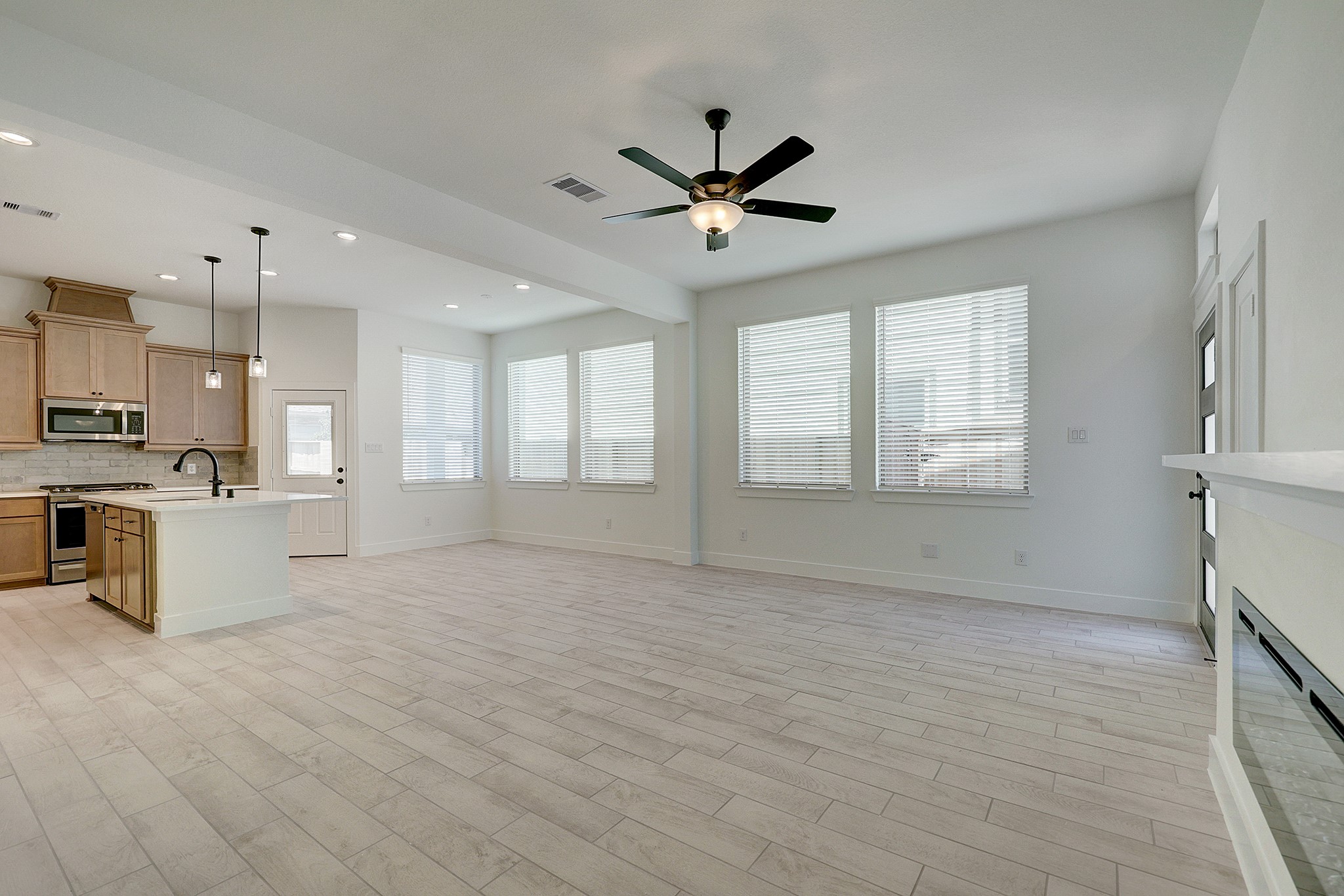 Open living space flows seamlessly into the kitchen. Open living space flows seamlessly into the kitchen.