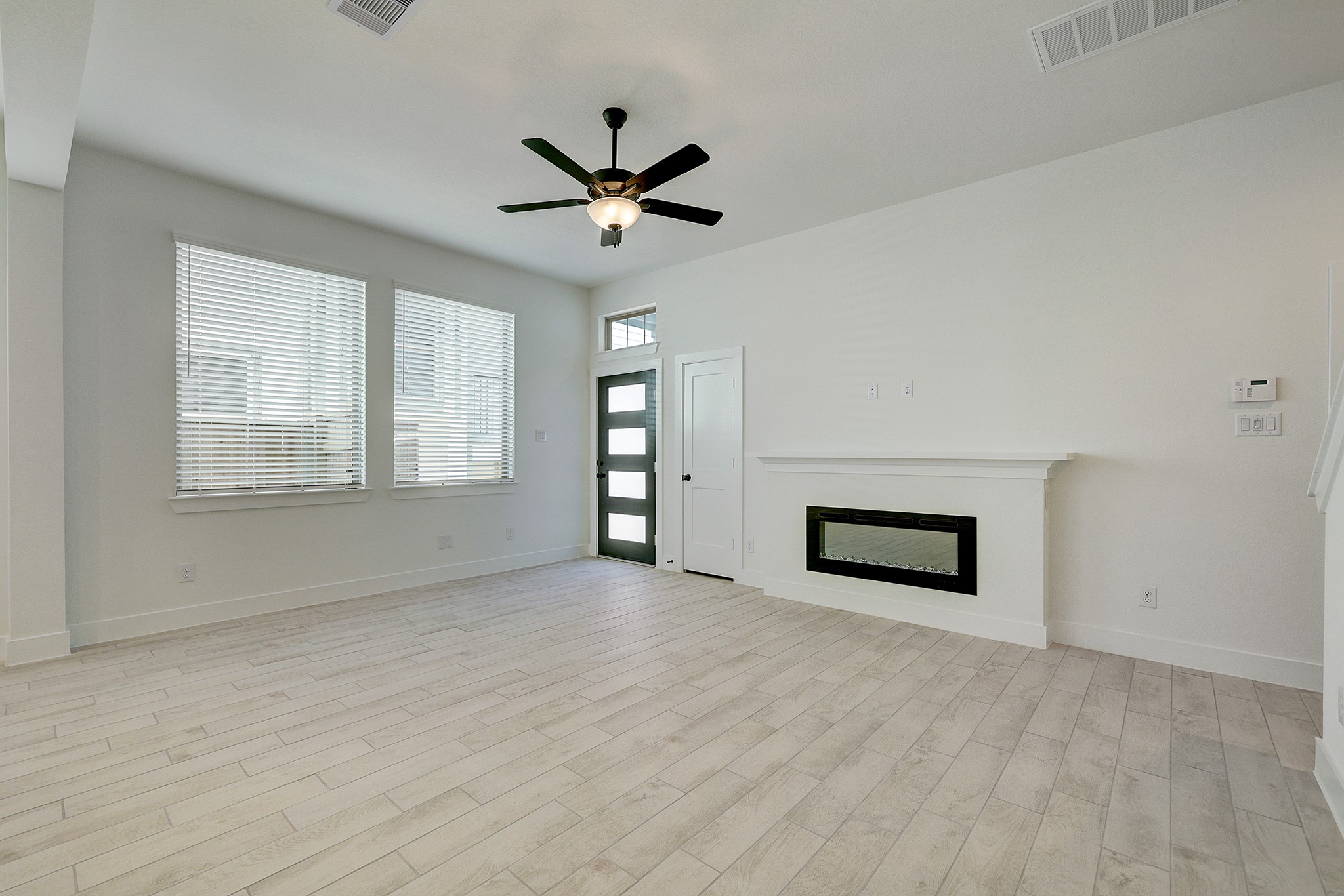Light-filled living area with clean, modern finishes. Light-filled living area with clean, modern finishes.