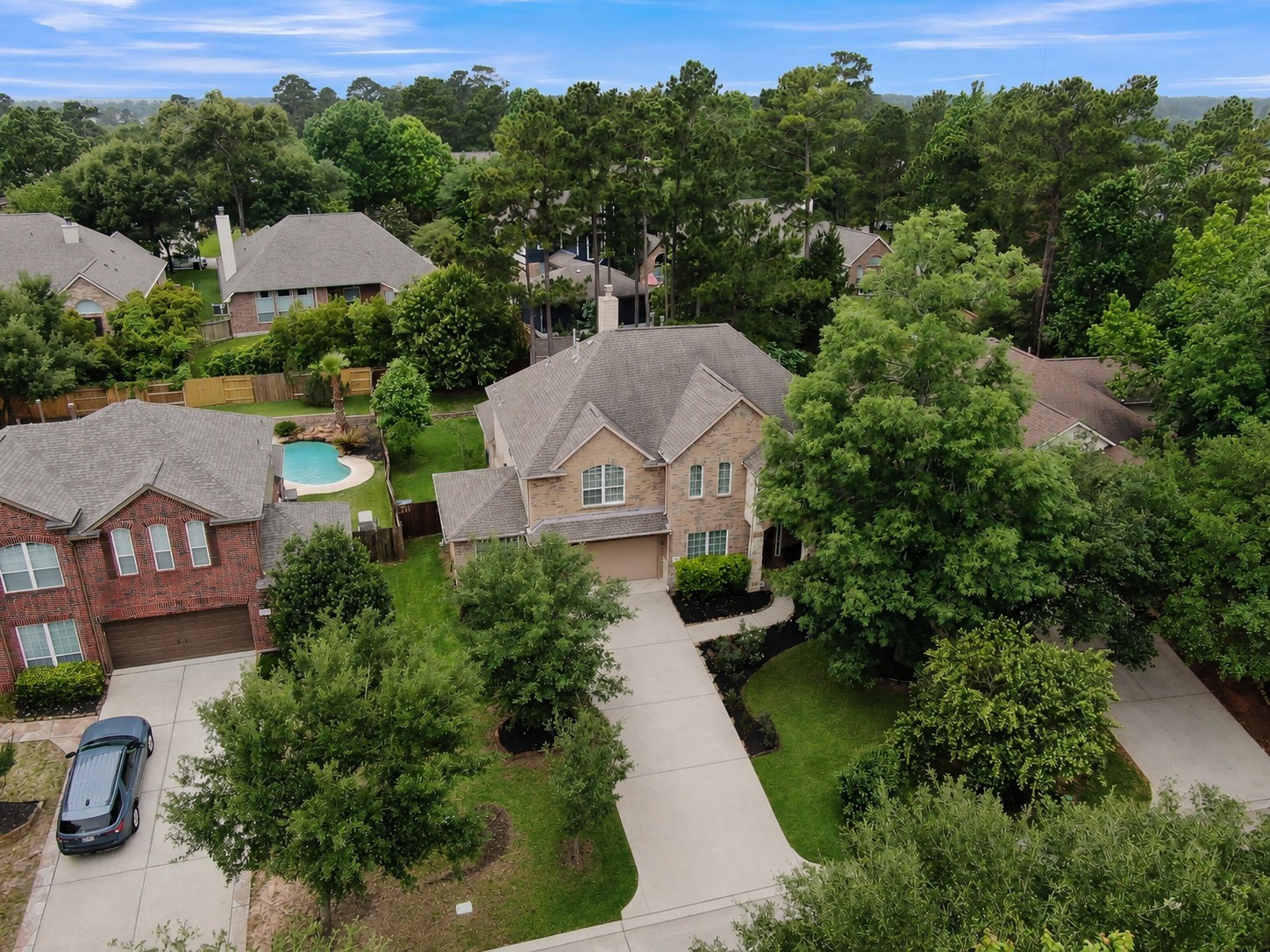 Beautifully situated on a quiet, tree-lined street with mature landscaping and a spacious lot. This home offers a peaceful setting with a private backyard retreat while still being close to shopping, dining, parks, and everyday conveniences.