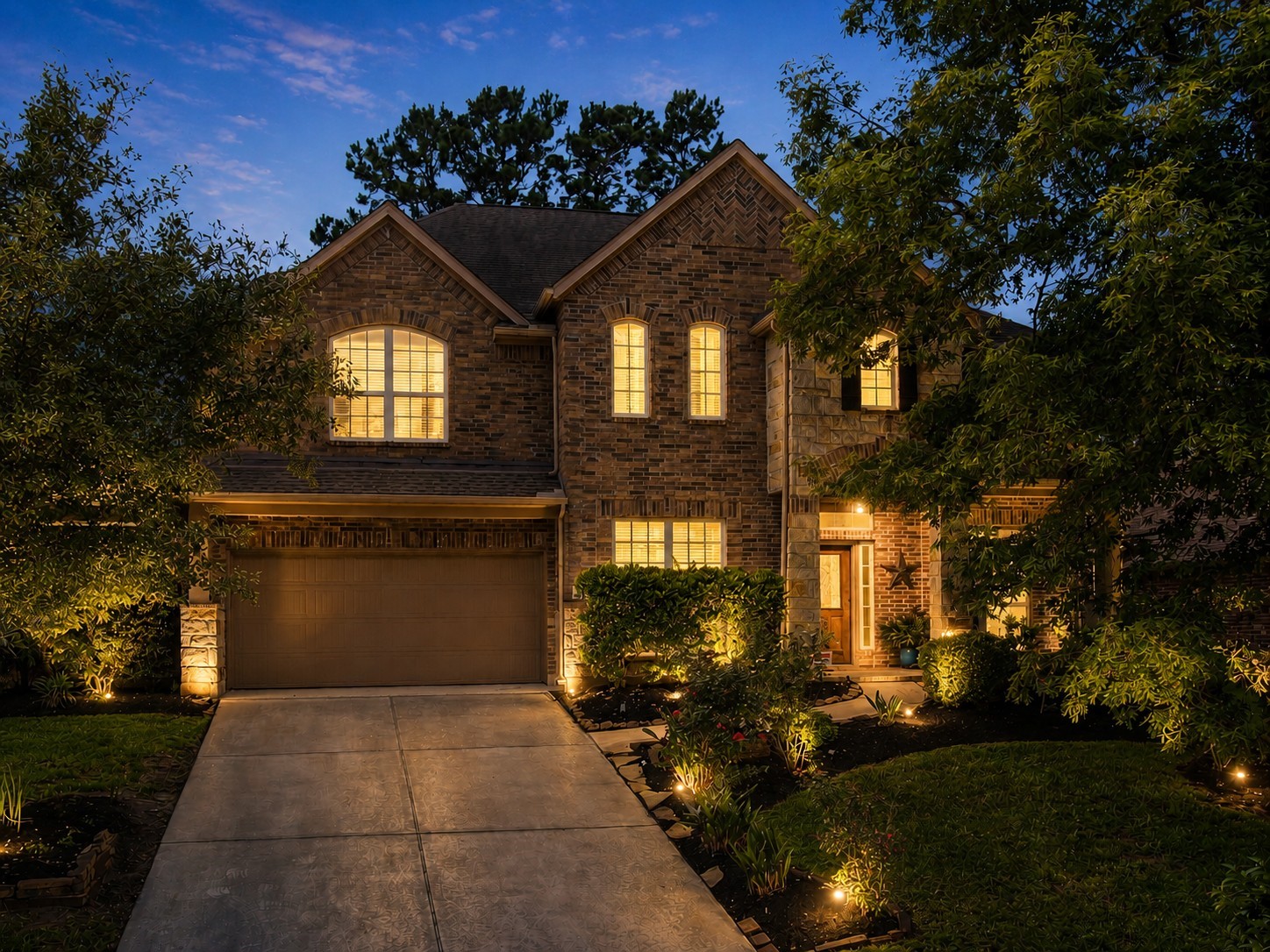 Beautifully maintained home with a private backyard retreat, covered patio, and inviting outdoor lighting. Warm interior glow and lush landscaping create the perfect setting for relaxing evenings and entertaining guests. Beautifully maintained home with a private backyard retreat, covered patio, and inviting outdoor lighting. Warm interior glow and lush landscaping create the perfect setting for relaxing evenings and entertaining guests.
