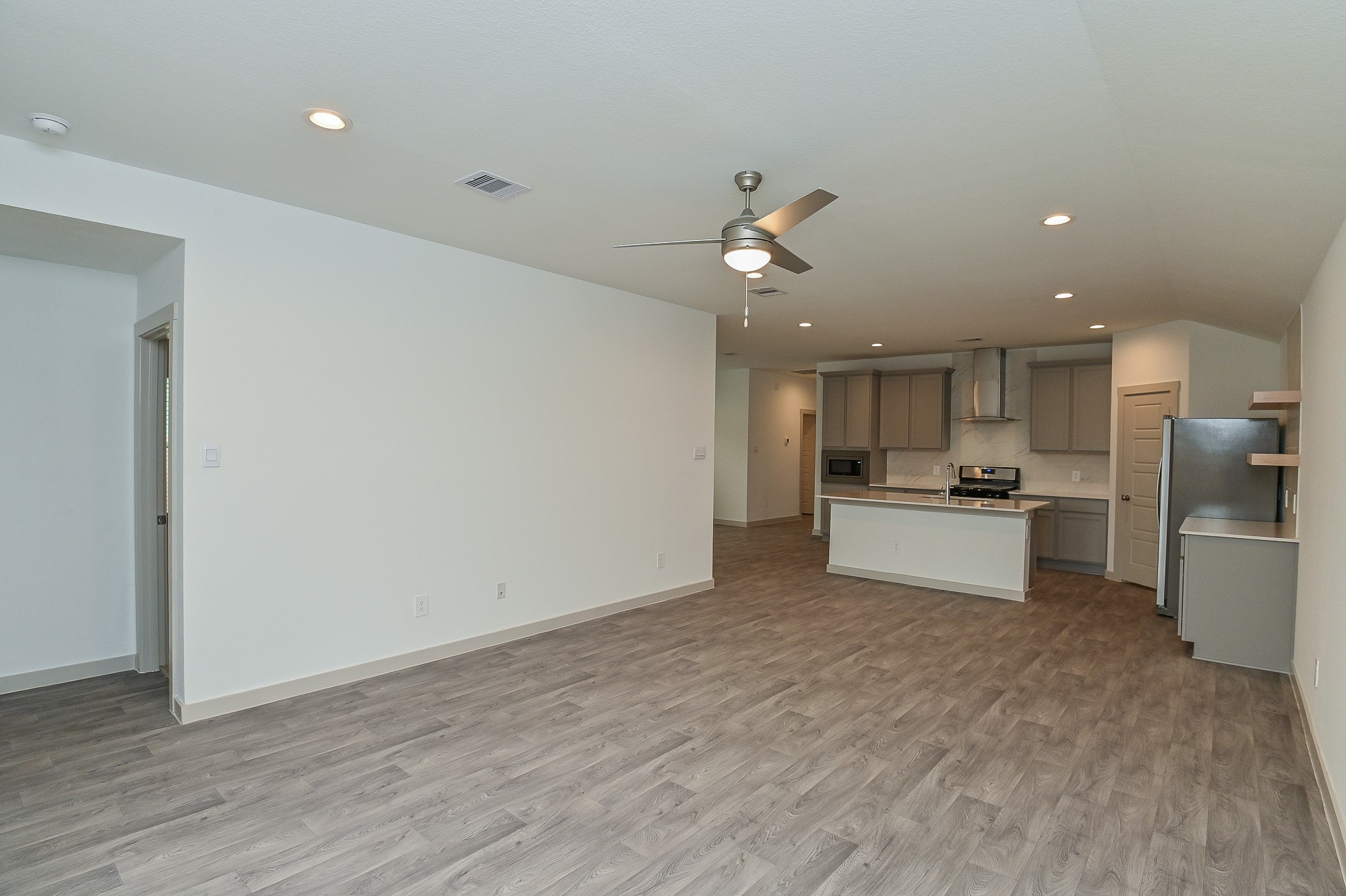 Open concept living room and kitchen Open concept living room and kitchen