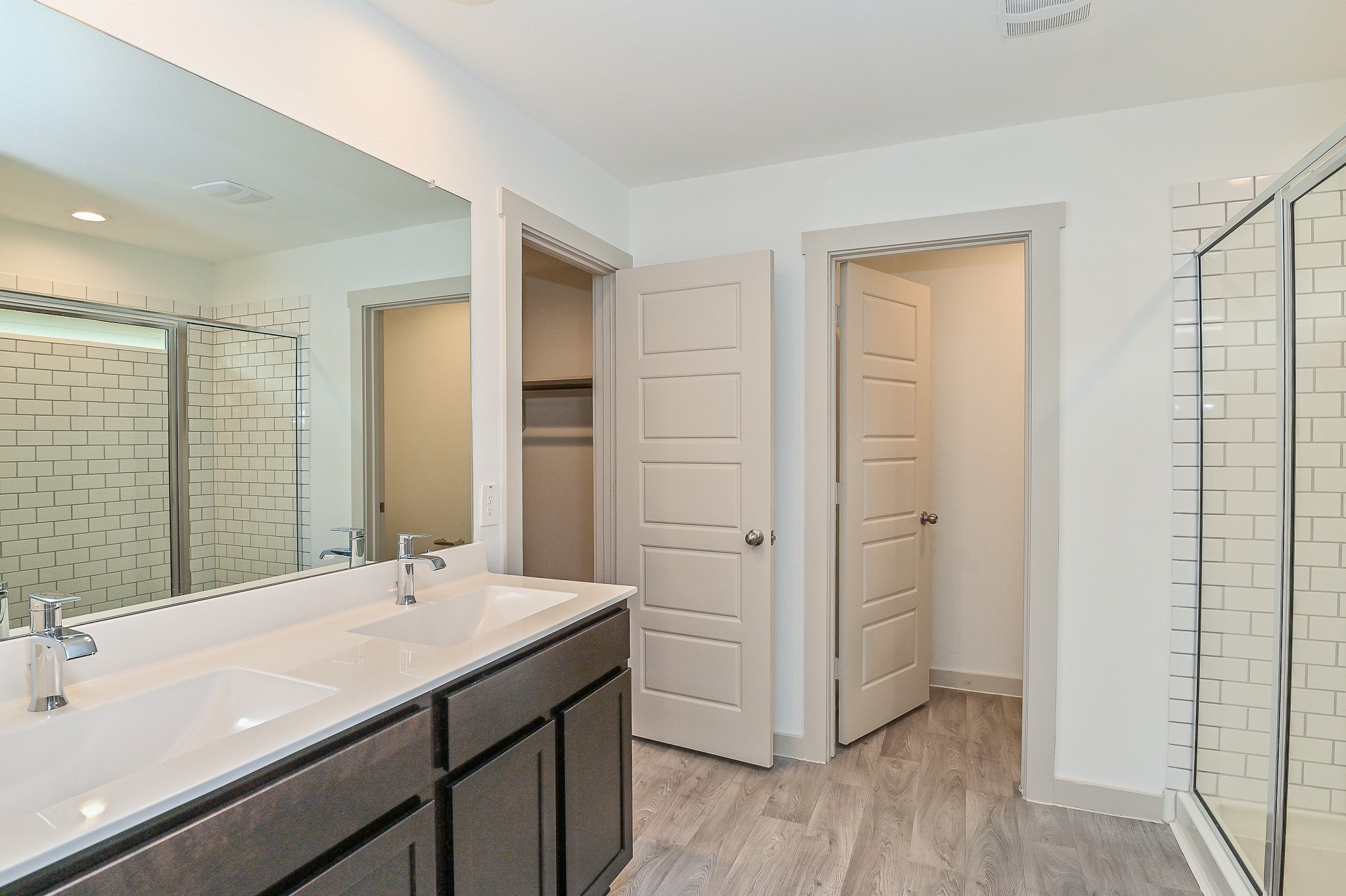 Master bathroom with dual vanity in ensuite.