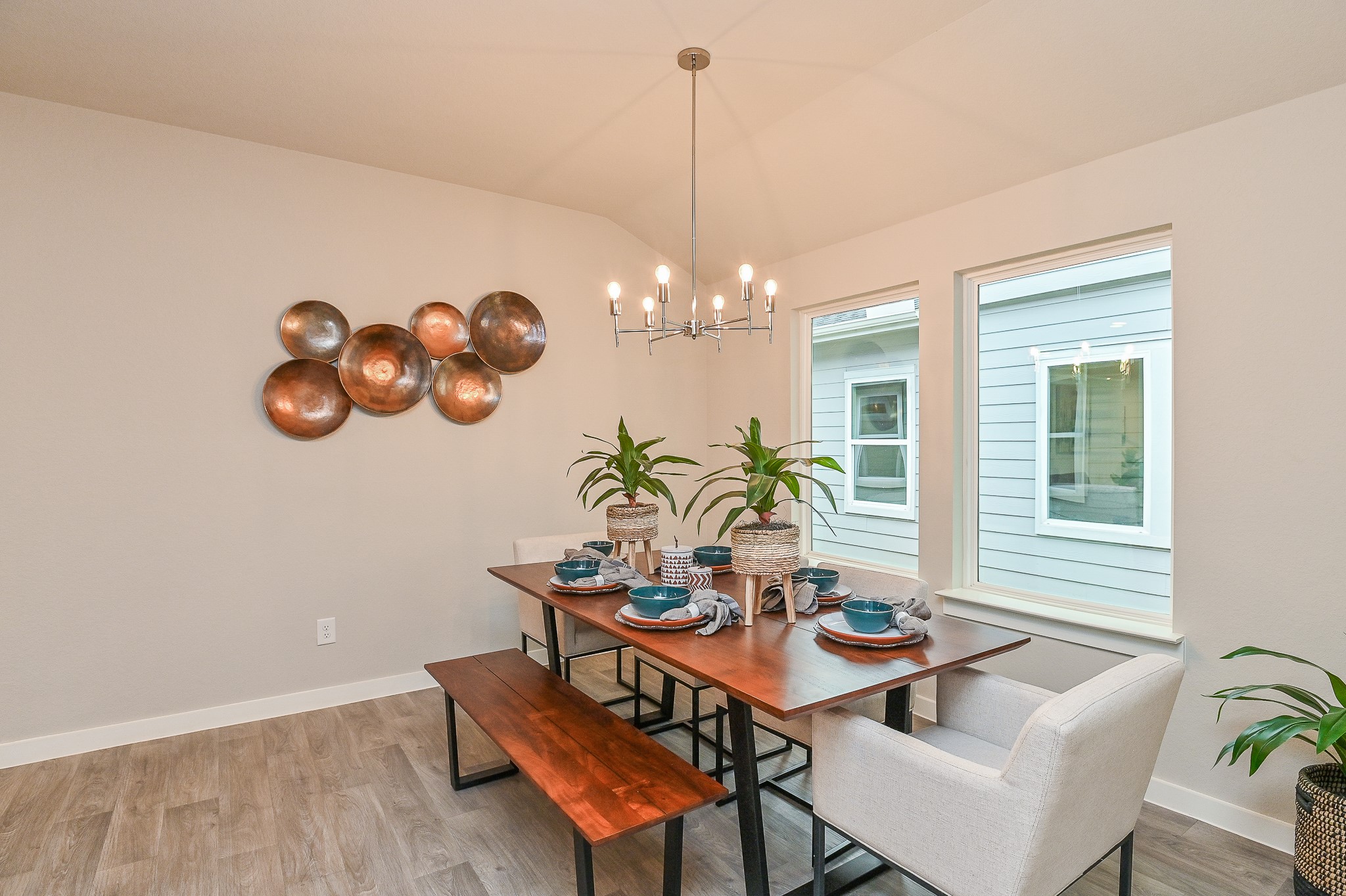 Dining area brings in plenty of light and has enough room to seat everyone at the table