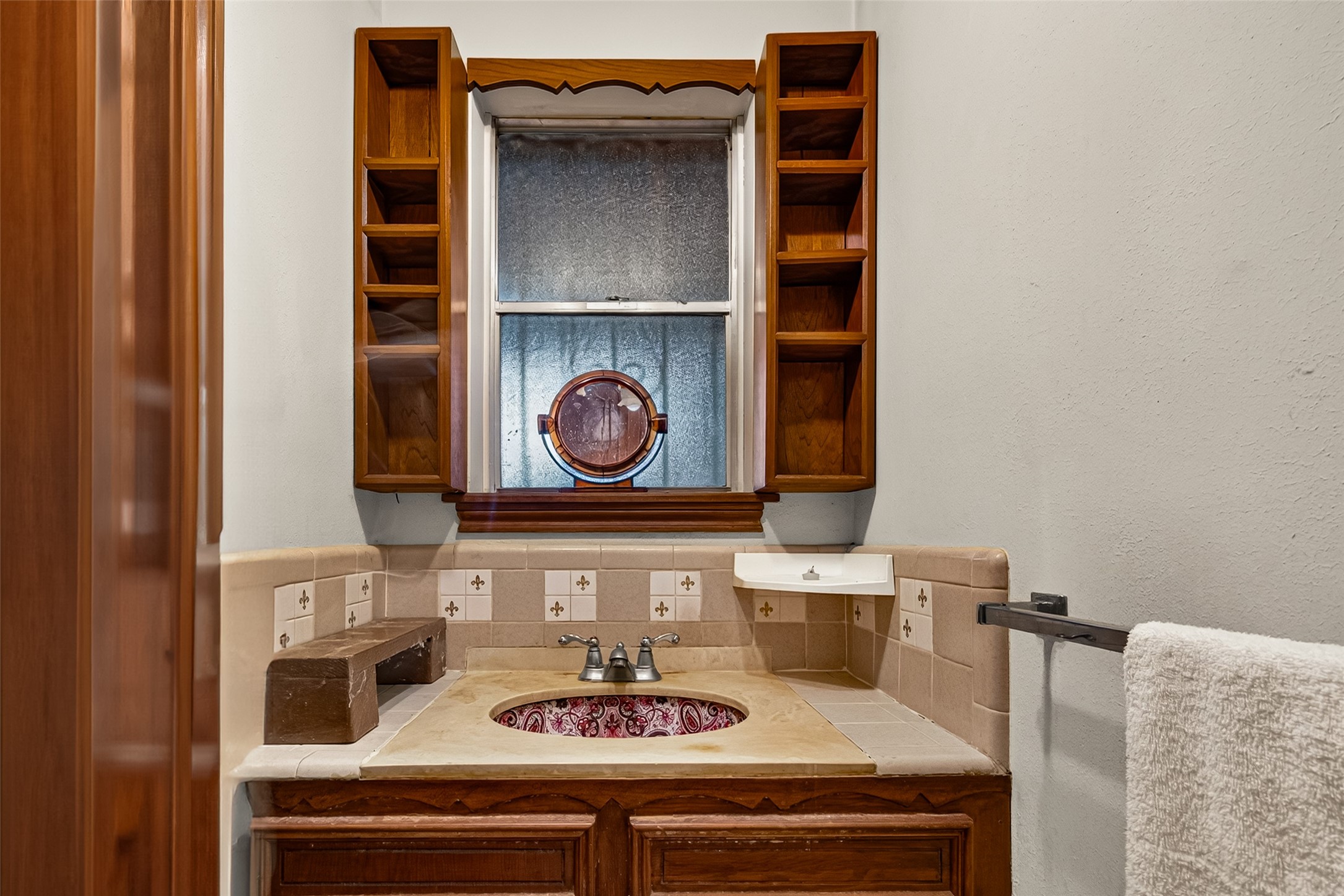 Half bath off Laundry and kitchen.
