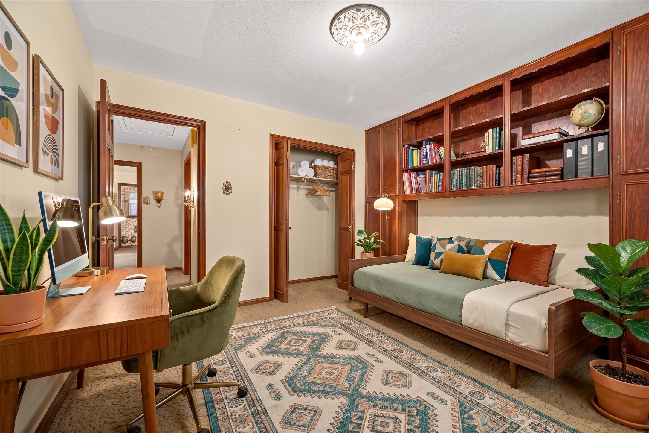 Secondary bedroom virtually enhanced as an office/ guest room.