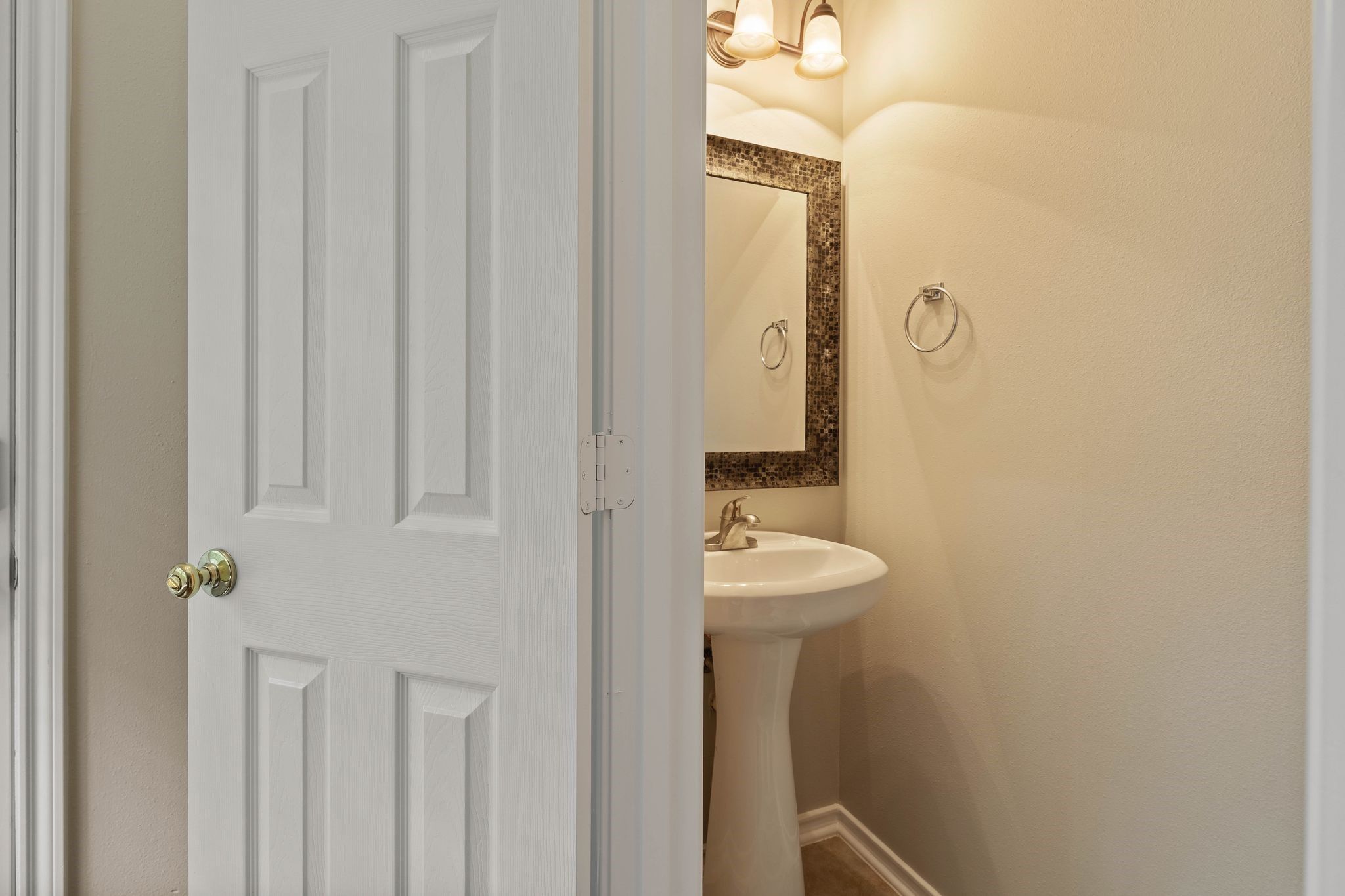 downstairs powder room convenient for guests