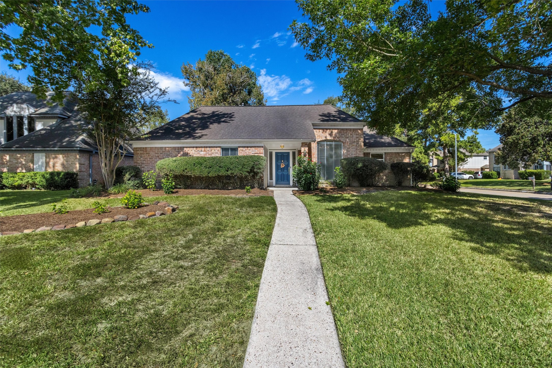Large Corner Lot with giant Oak shade tree.