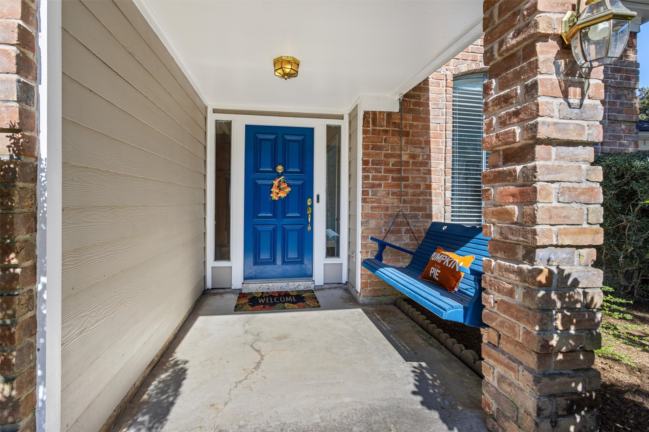 Covered Front Entry with Porch Swing