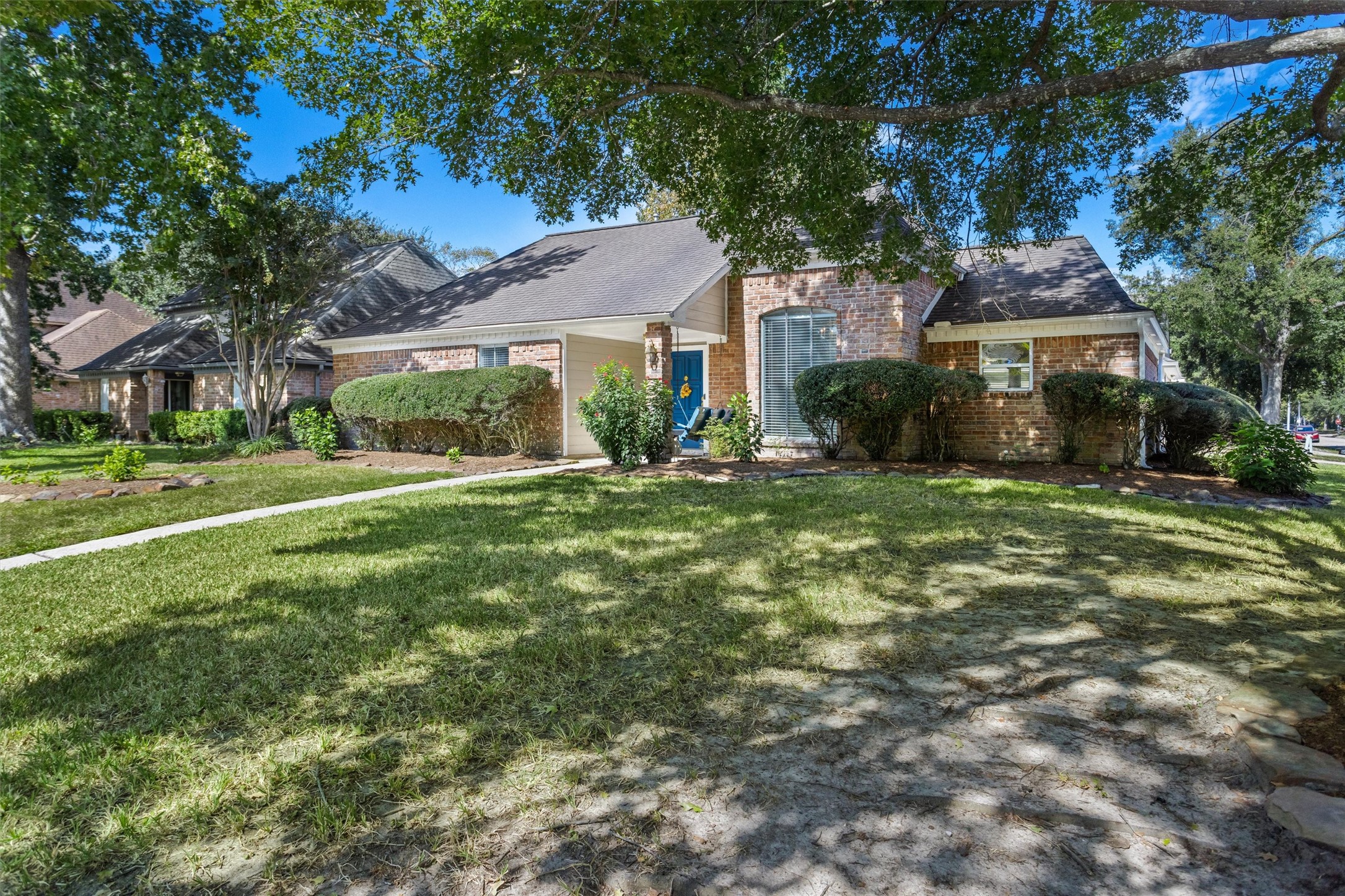 Large Corner Lot with giant Oak shade tree.