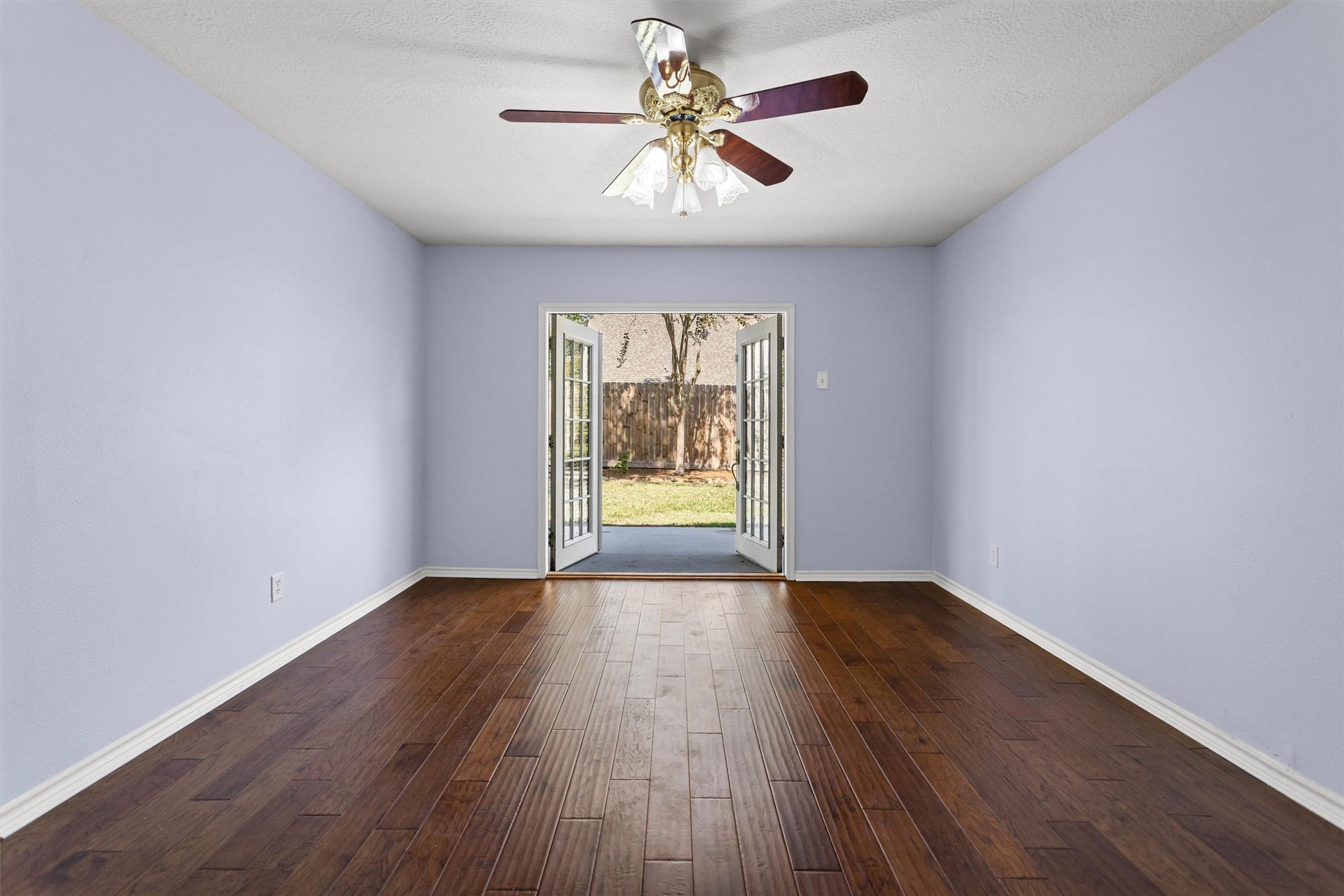 Primary Bedroom with Double French Doors