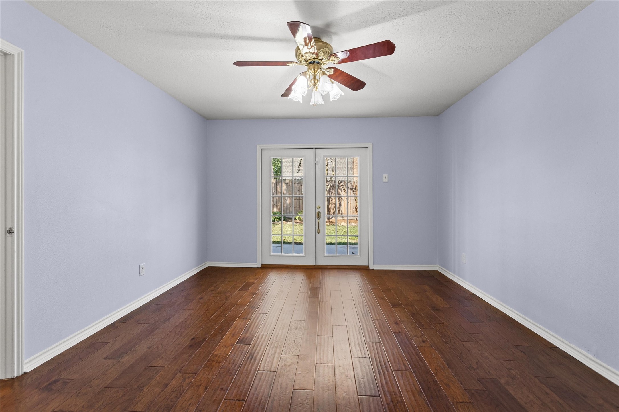 Primary Bedroom with Double French Doors