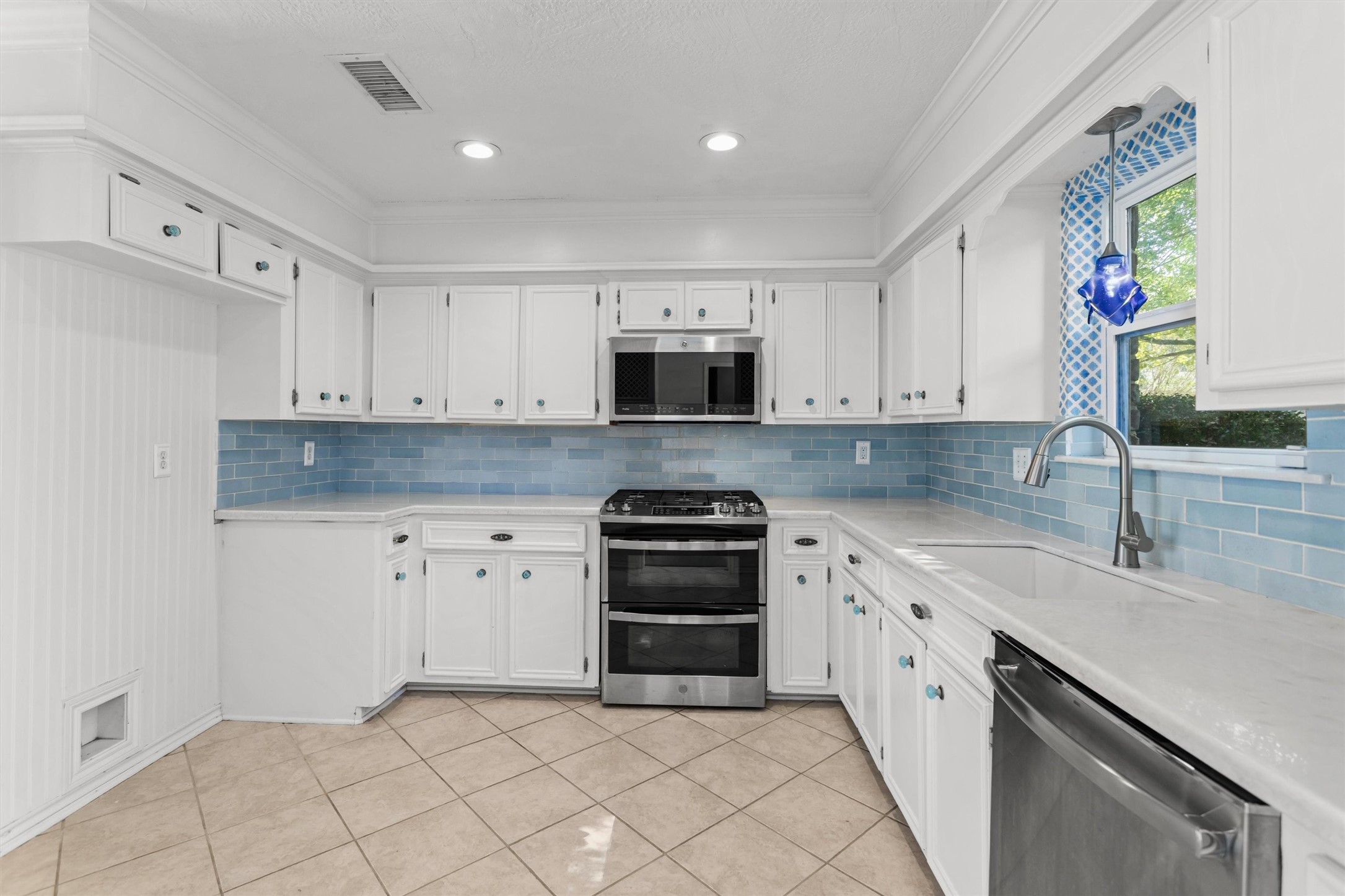Kitchen with Stainless Appliances and LED Can Lights