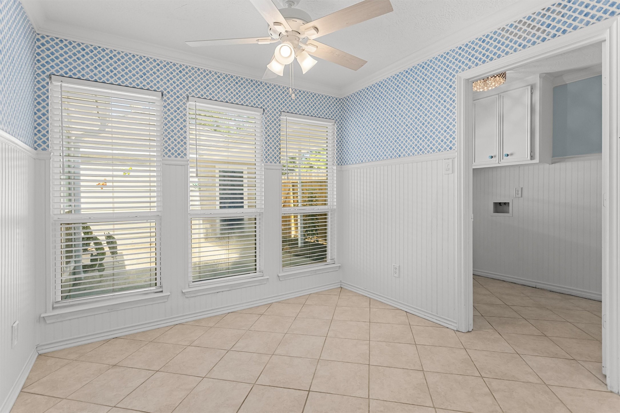 Breakfast room with Wainscoting and Double-paned Windows