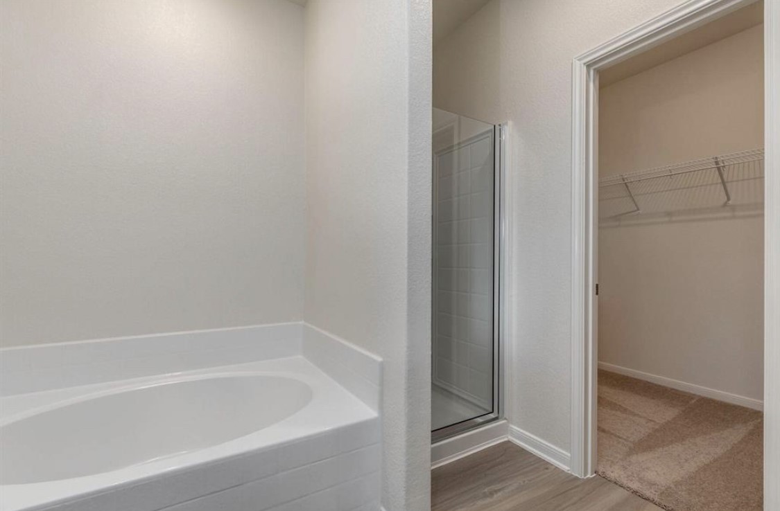 Primary bathroom and Walk-in closet.