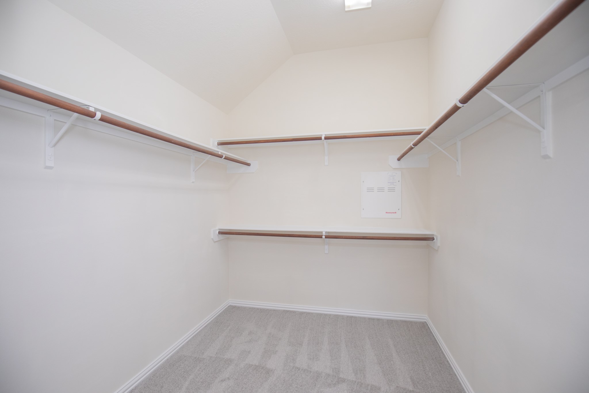 Primary master bedroom walk-in closet