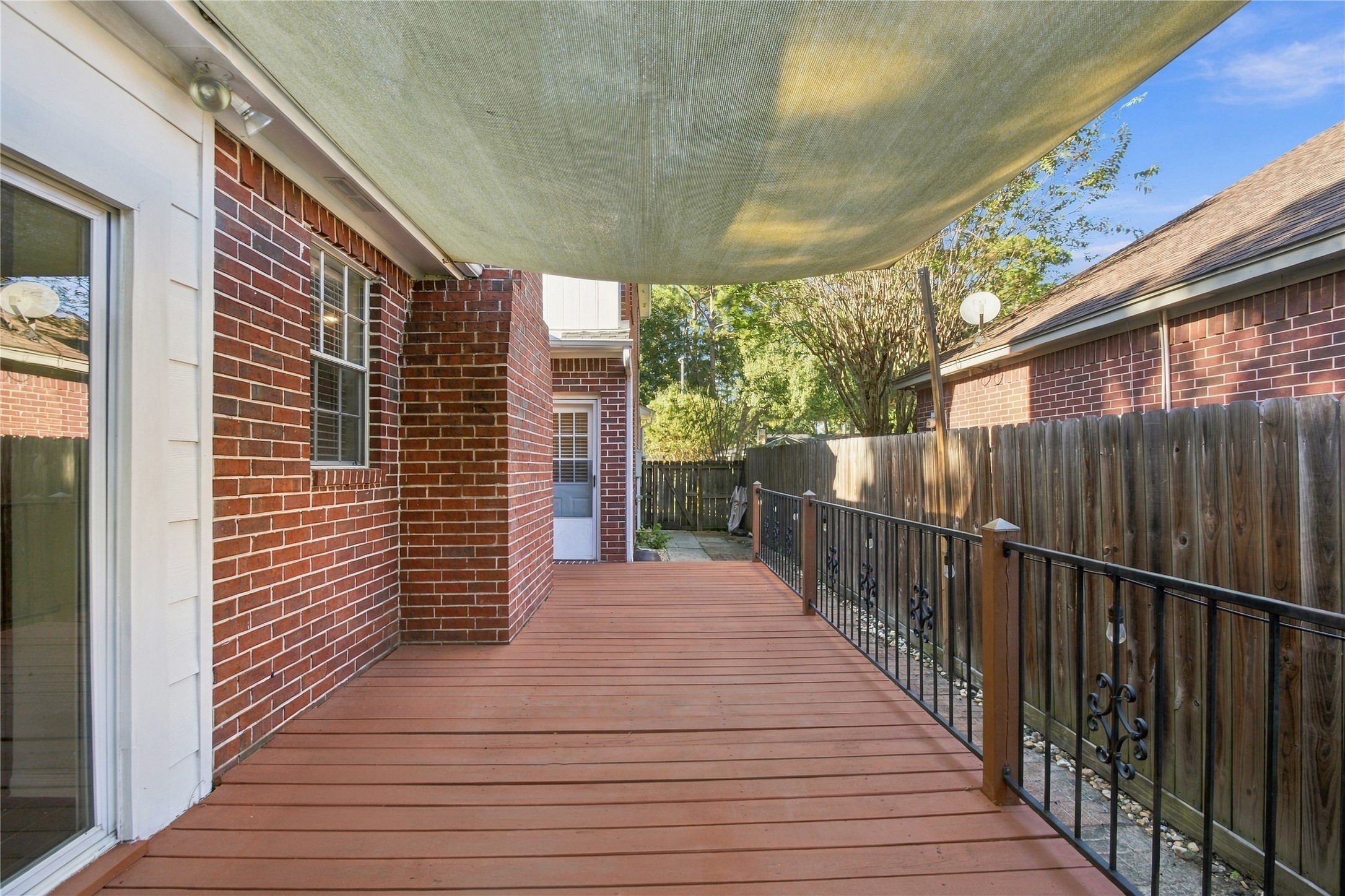 Deck off of breakfast room exit and game room exit