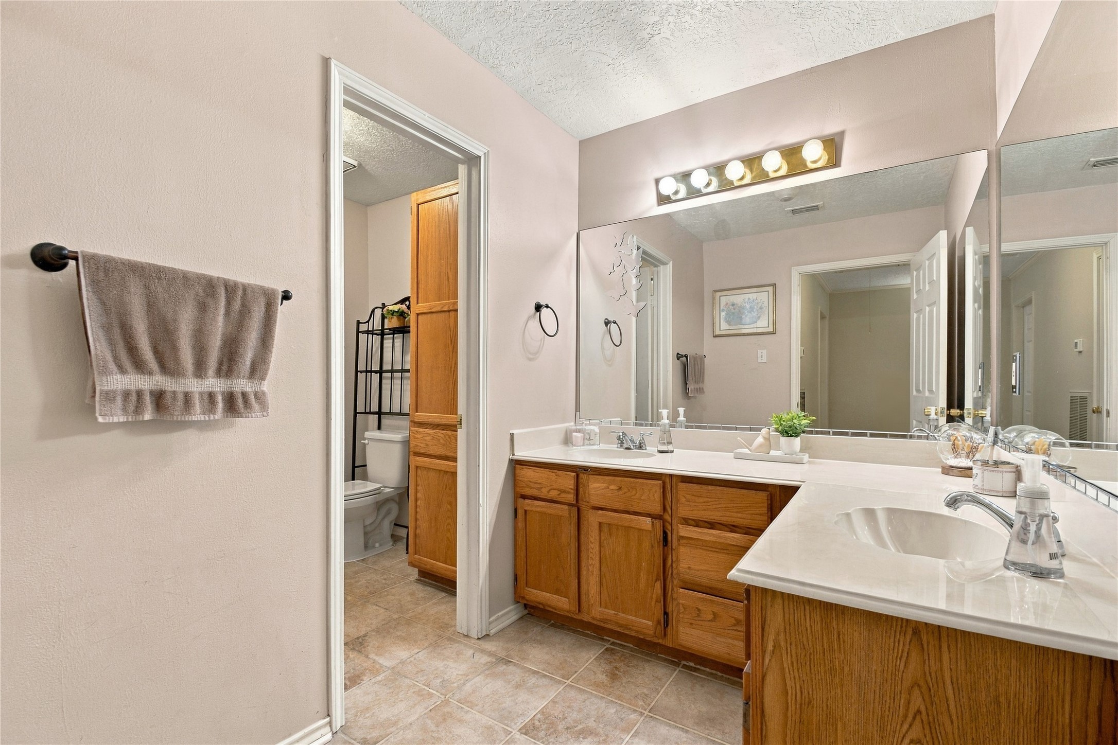 Secondary bathroom with dual vanity