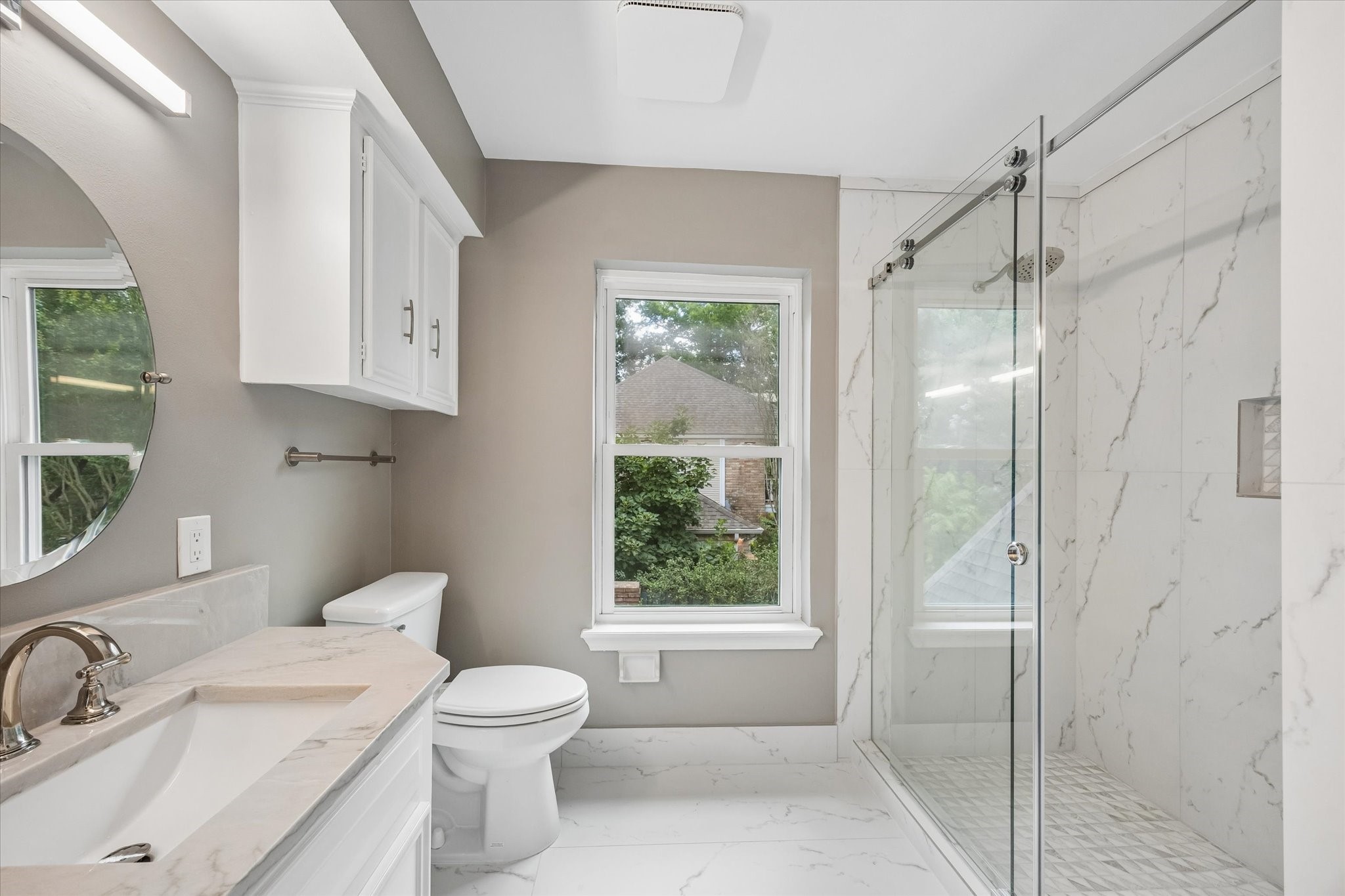 PRIMARY BATH - Full renovation!  brand new tile, shower, updated vanity and fixtures!