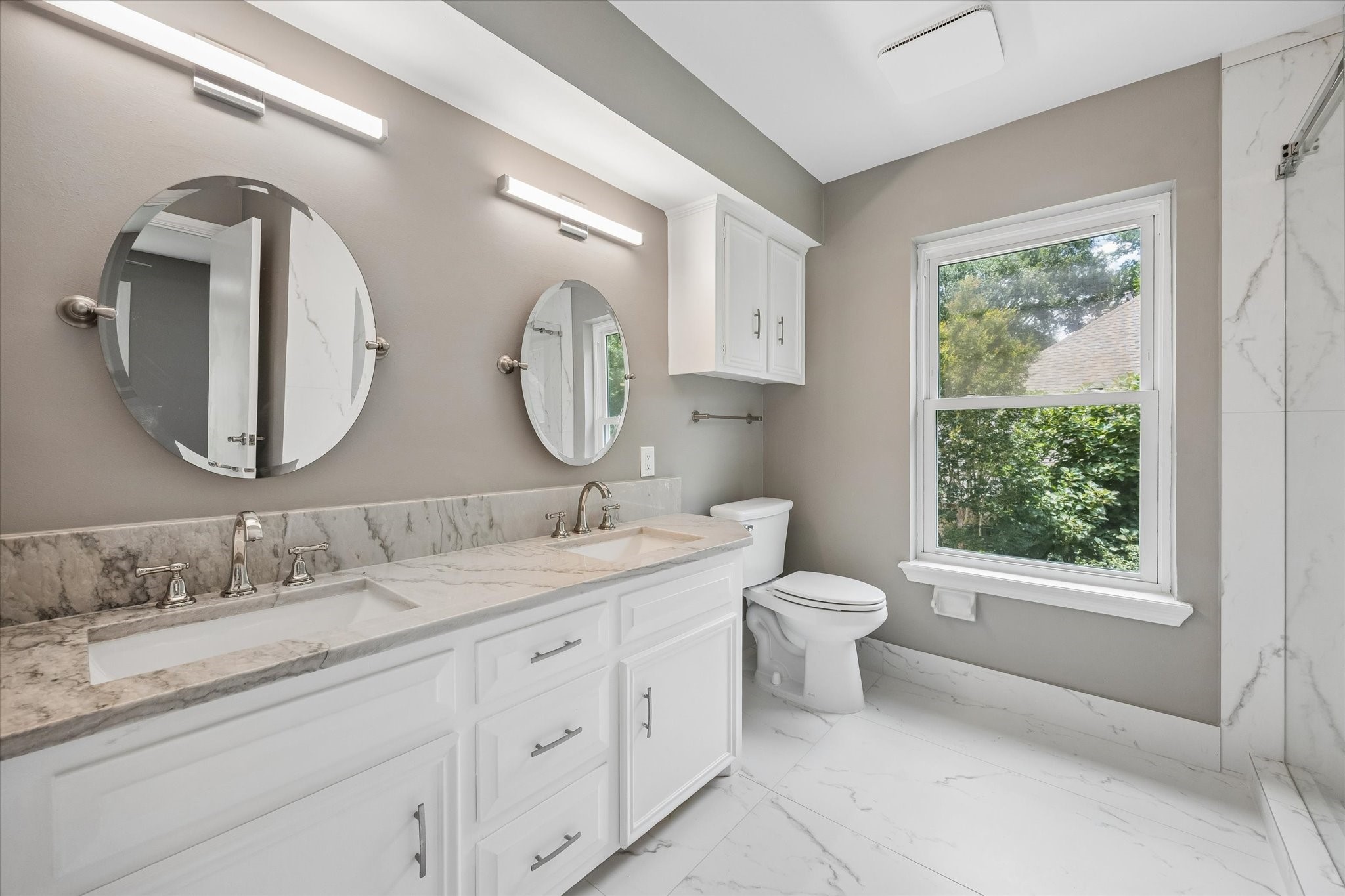 PRIMARY BATH - Full renovation!  brand new tile, shower, updated vanity and fixtures!