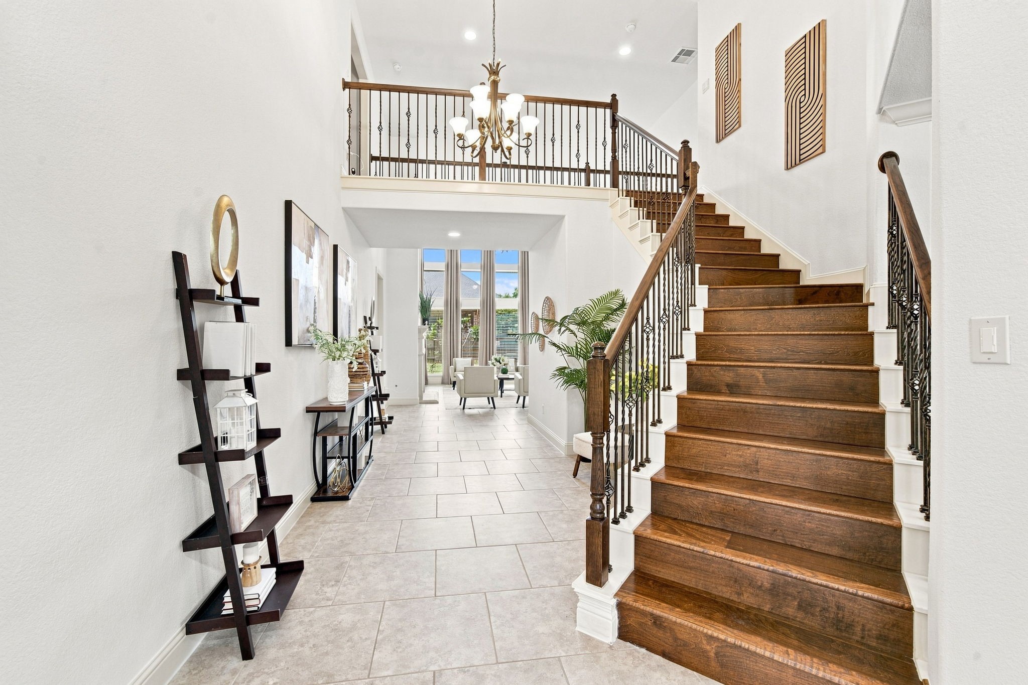 Walk into the home with a two-story foyer. A spacious two-story foyer welcomes you inside, featuring an upgraded staircase, and an open layout that adds to the homes comfortable feel.