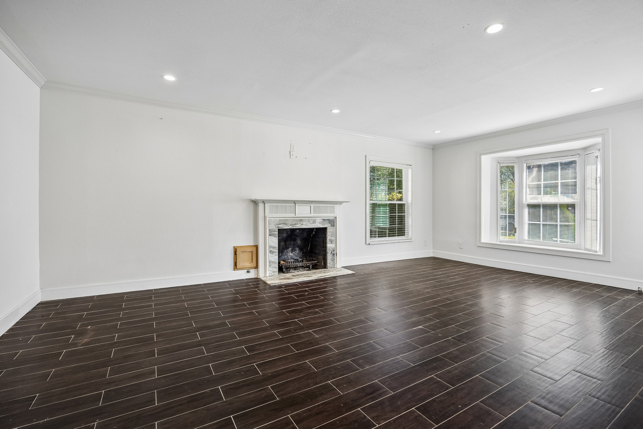 Formal living room with fireplace.