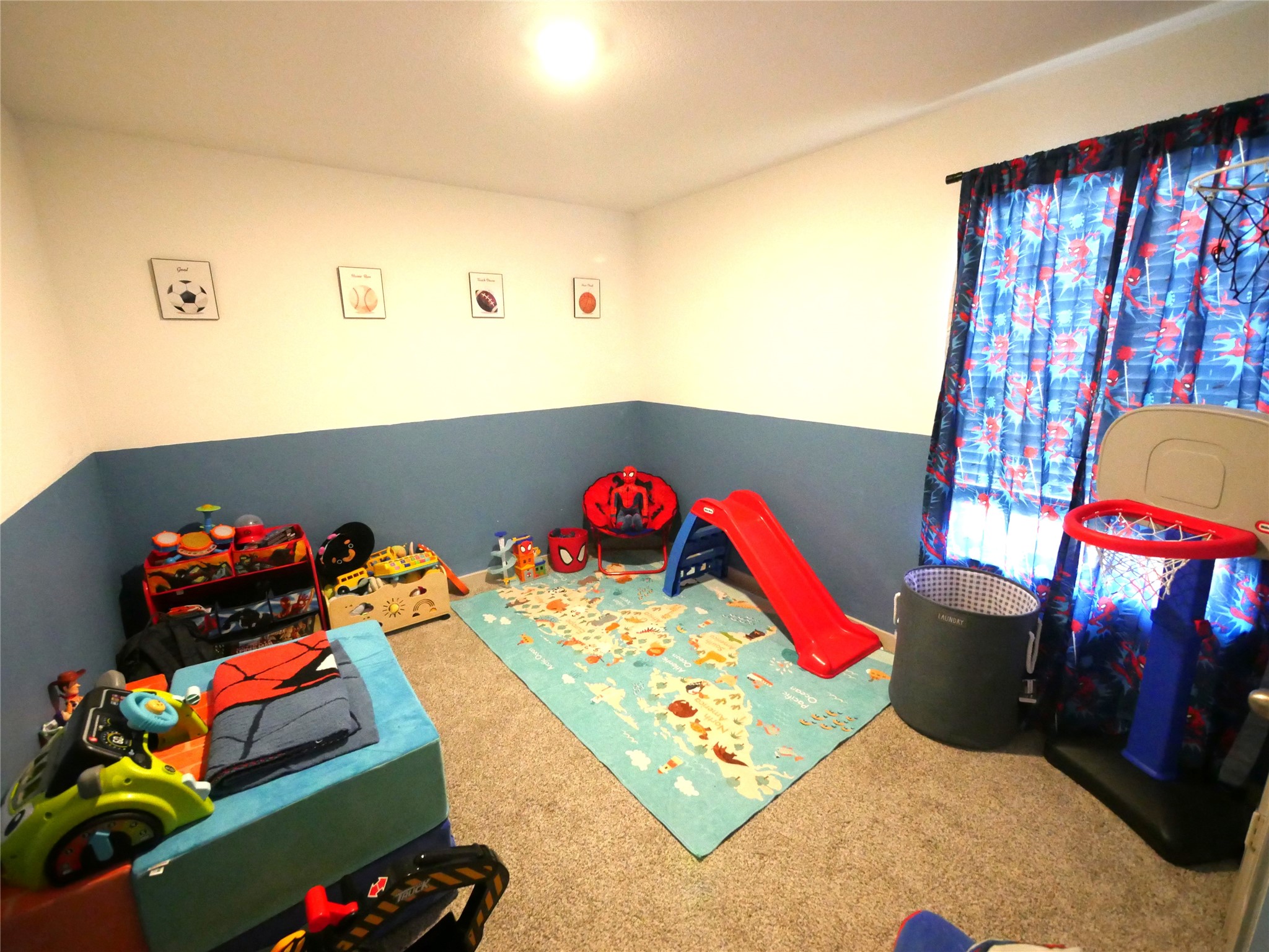 Spacious secondary bedrooms offer comfortable living space, natural light, and flexibility for family, guests, a home office, or personal retreat.