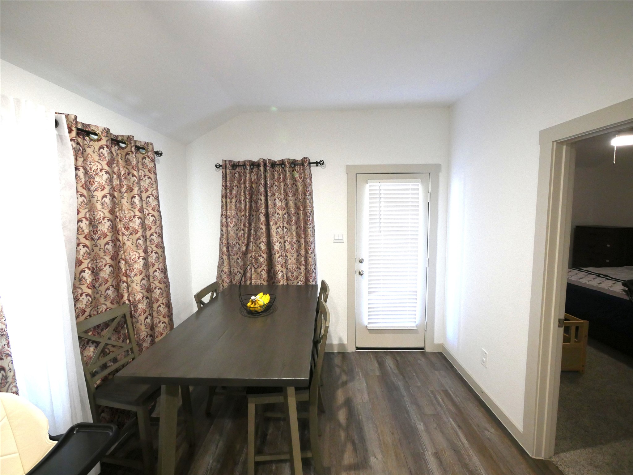 Bright dining area seamlessly connects with the kitchen and living spaces, creating an inviting setting for everyday meals and entertaining. Bright dining area seamlessly connects with the kitchen and living spaces, creating an inviting setting for everyday meals and entertaining.