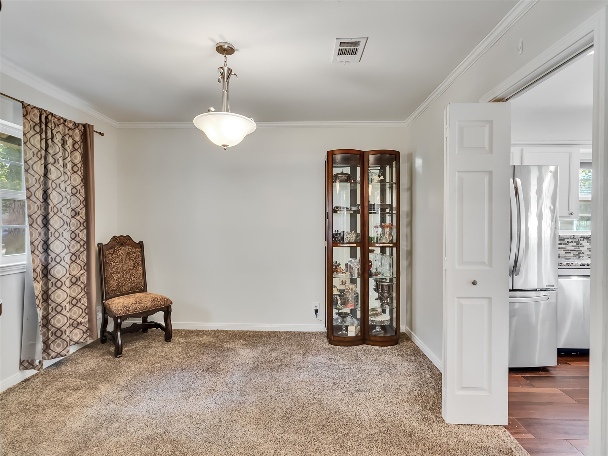 Formal dining room makes a great office space. A formal living room not pictured makes a large formal dining room.