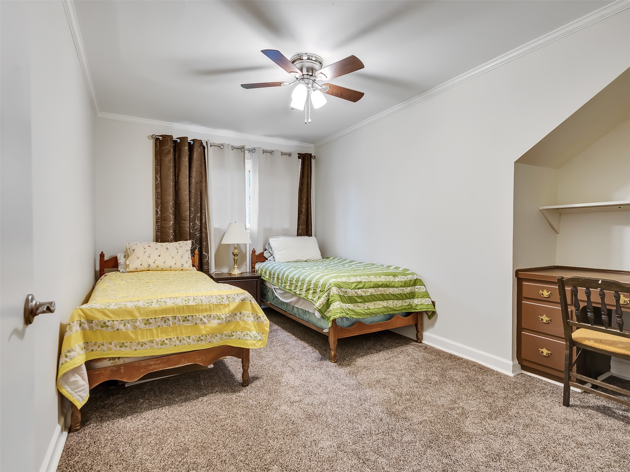 The 5th bedroom offers a built-in desk.